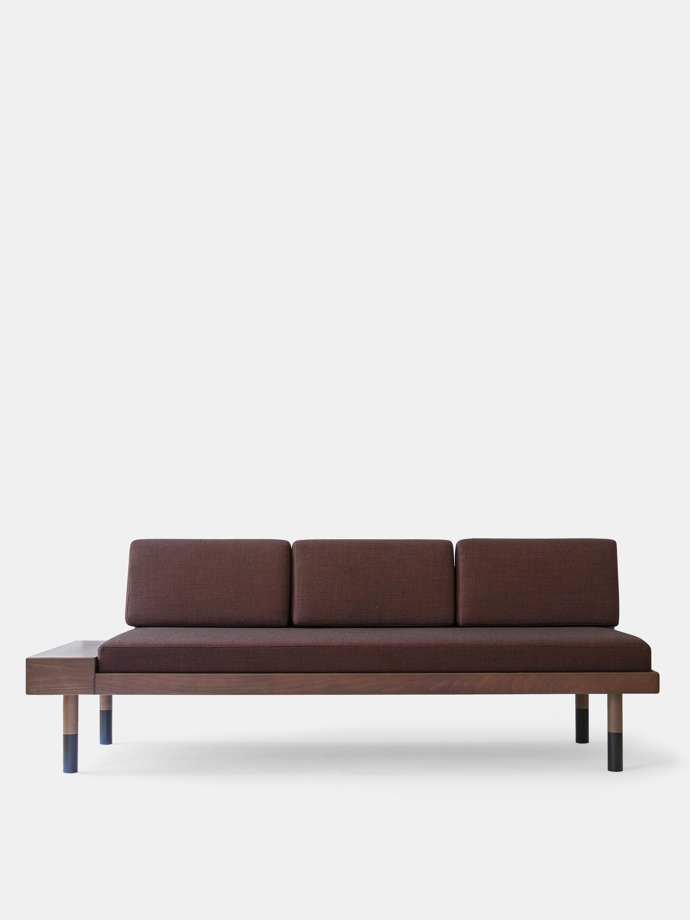 Burgundy Mid Sofa by Kann Design
Dimensions: D 70 x W 200 x H 74 cm.
Materials: Solid wood, steel, wood veneer, HR foam, fabric upholstery Kvadrat Sunniva 373 (58% wool, 25% viscose, 8% linen, 5% nylon, 4% polyester).
Available in other