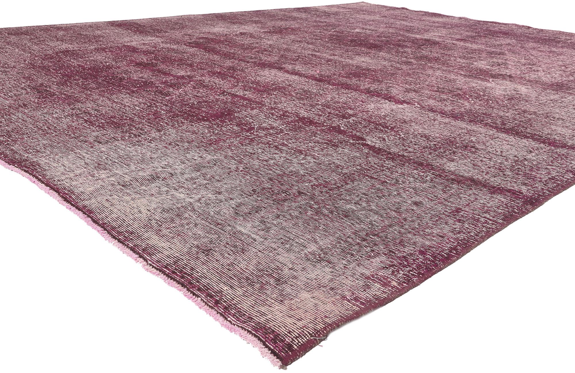 60696 Vintage Turkish Overdyed Rug, 10’00 x 13’00.
Modern Industrial meets rustic elegance in this hand knotted wool vintage Turkish overdyed rug. The erased botanical design and rich color palette in this piece work together capturing the essence