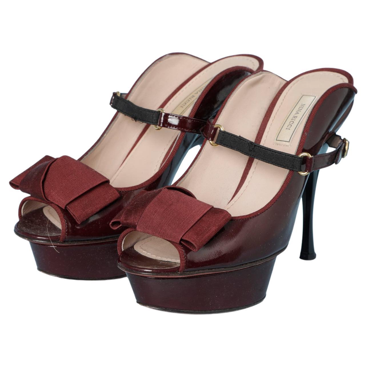 Burgundy patent leather platform sandal with "gros-grain" bow Nina Ricci 