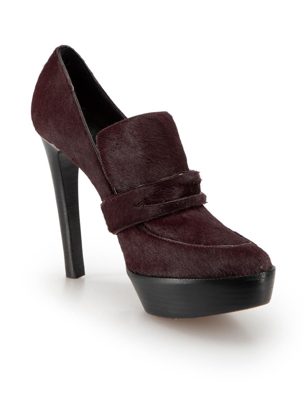 CONDITION is Very good. Minimal wear to shoes is evident. Minimal wear to both platforms and the left shoe heel-stem with scuffs on this used Burberry designer resale item. These shoes come with original box and dust bag.



Details


Burgundy

Pony