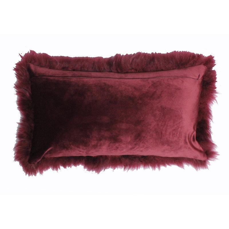 Add opulent styling to a bed or sofa with the luxury and softness of this limited edition cashmere fur pillow, with only a few pillows made in this rich and lustrous, limited edition burgundy cashmere fur. The rectangle fur pillow is handcrafted in