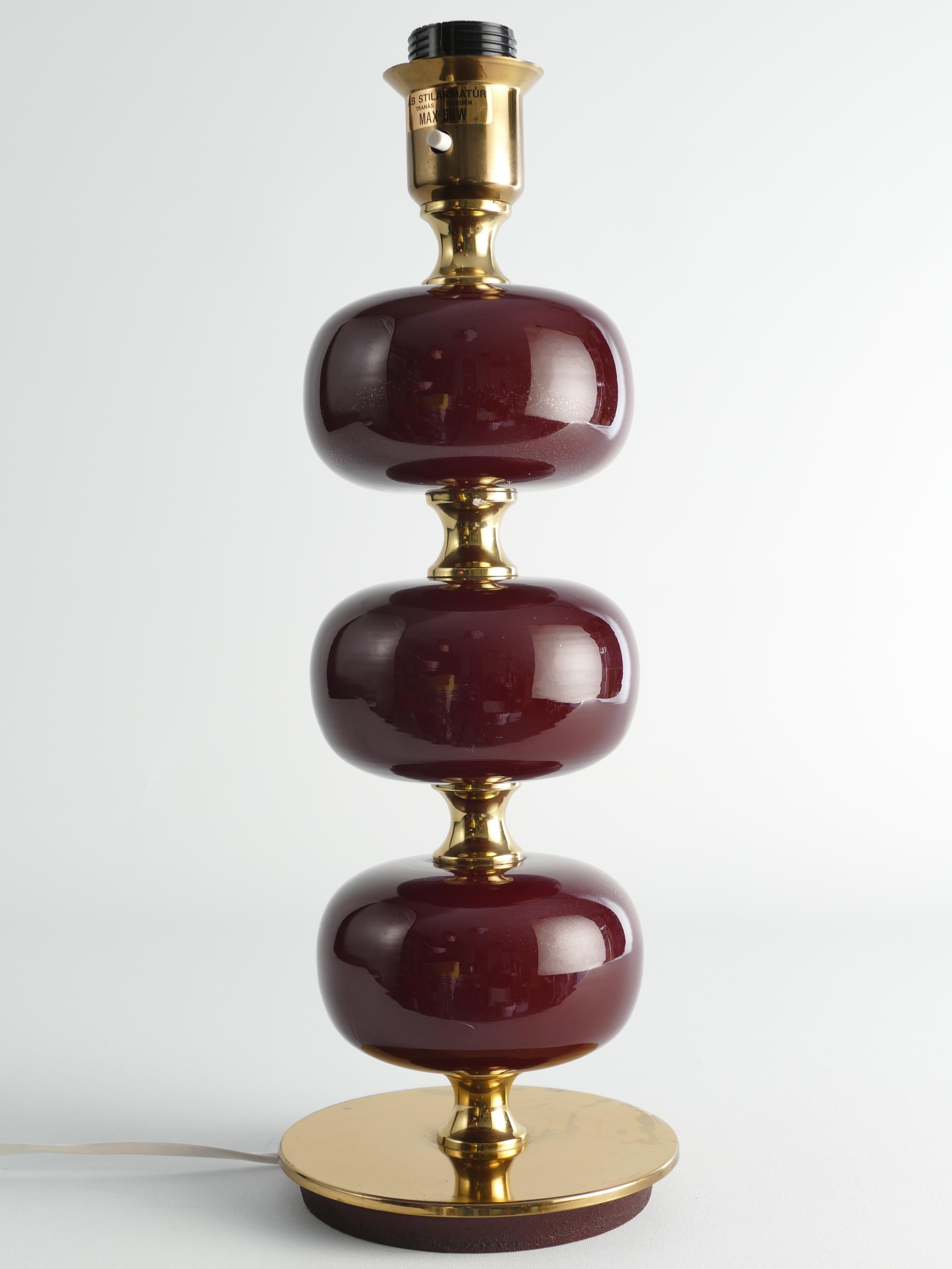 Mid-20th Century Burgundy Red Glass and Brass Table Lamp Tranås Stilarmatur, 1960s For Sale