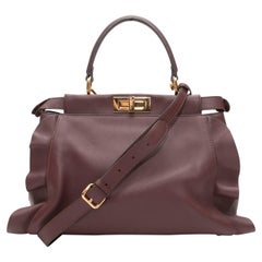 Borsetta Fendi Peekaboo con volant in borgogna e verde acqua