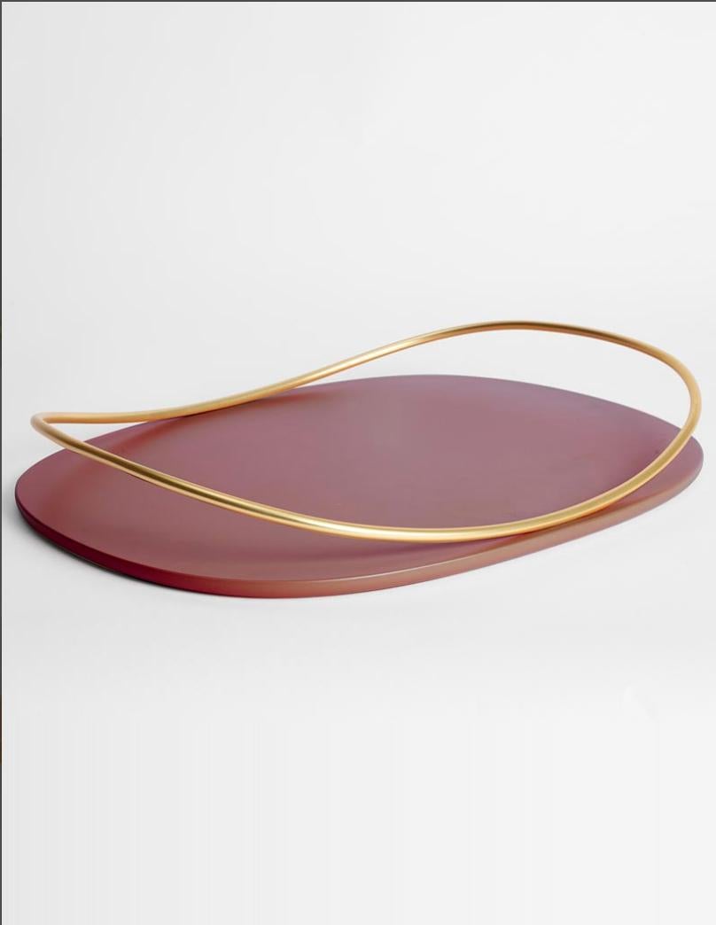 Burgundy touché C tray by Mason Editions
Dimensions: 36 × 48 × 6.4 cm
Materials: Iron and MDF
Colours: taupe, cotto, burgundy, sage green, petrol green

A light metal rod that rests on the surface and then lifts up, almost touching the surface with