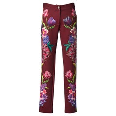 Pantalón burdeos con estampado de flores y strass Gai Mattiolo Love to Love