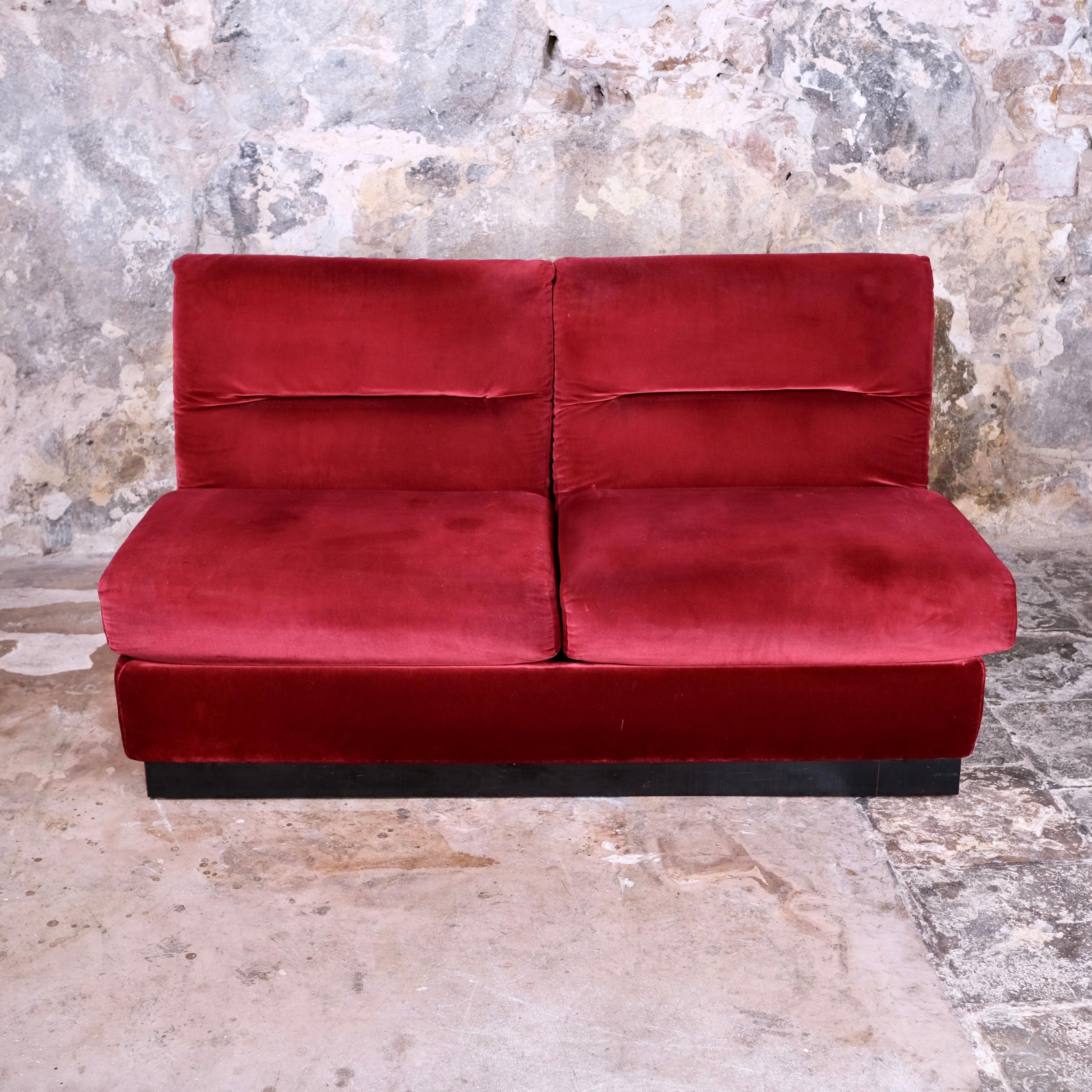 Nice curgundy velvet sofa, made in France in the 1980s, in the style of Michel Ducaroy's Albany or Jacques Charpentier.
Black wood laminate on wooden base.
Good condition overall, traces of time, few light stains, see pictures.
Can be sold in a set