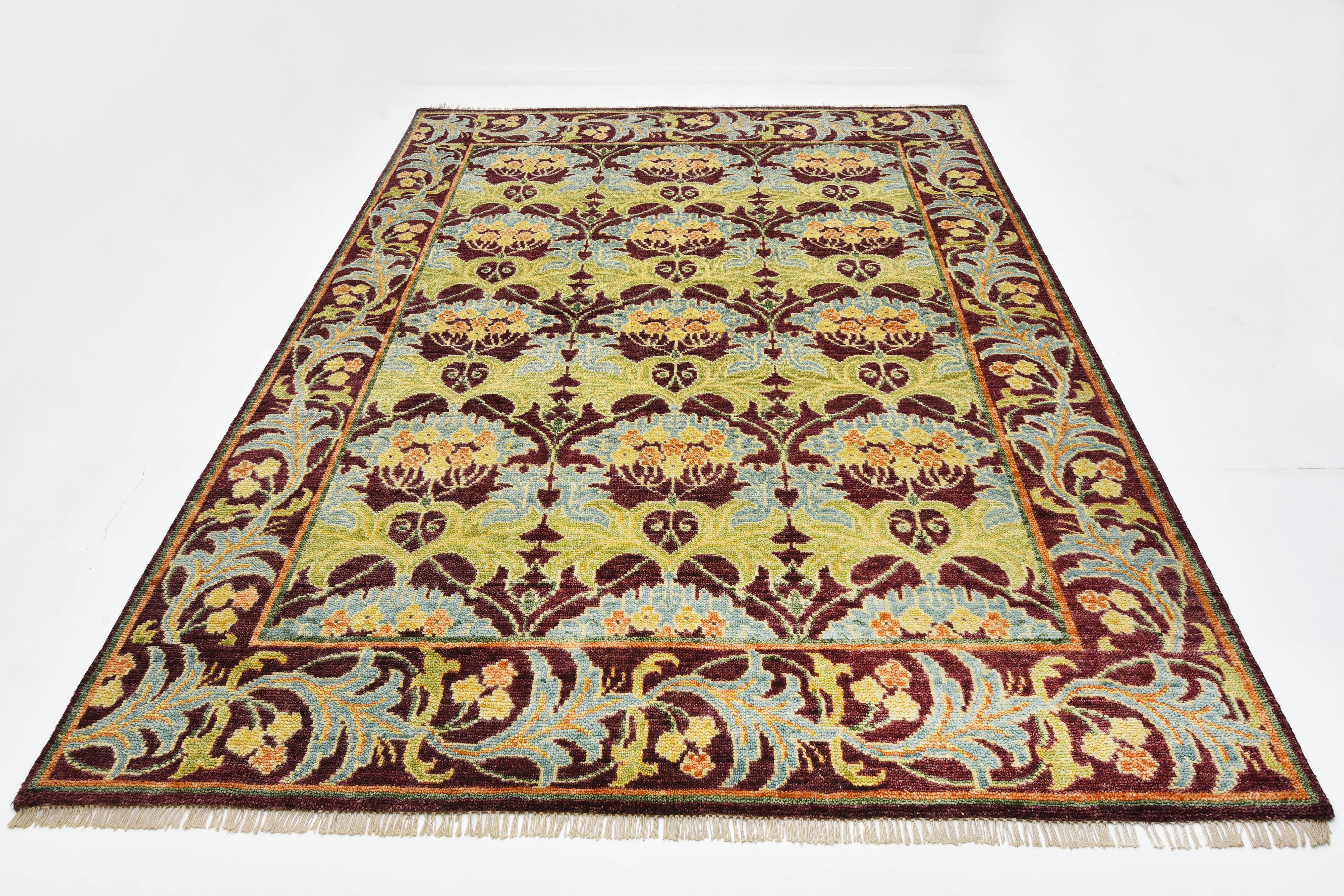 Hand-knotted, wool pile on a cotton foundation.

8' x 10'

New

Origin: India

Field Color: Burgundy

Border Color: Burgundy

Accent Color: Ivory, Blue, Green, Gold, Burnt-Orange.