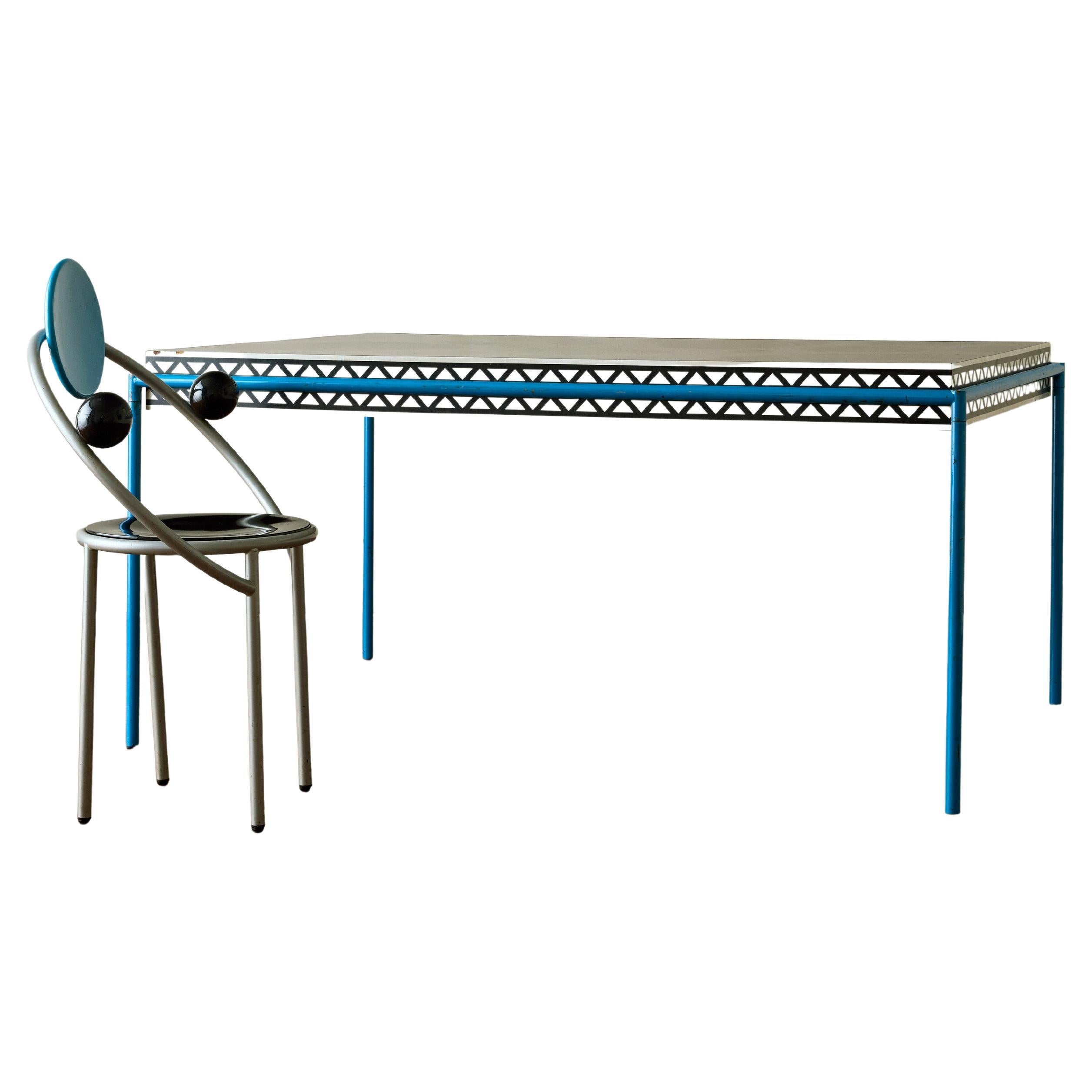 Mesa de comedor y primera silla "Borgoña" de Michele de Lucchi