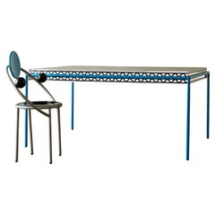 Mesa de comedor y primera silla "Borgoña" de Michele de Lucchi