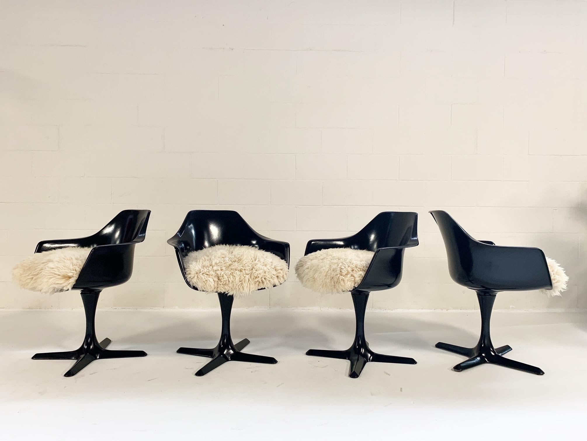 The Tulip style chair from Burke Inc. was inspired by the famous Eero Saarinen Tulip chair. The most noticeable difference between the two designs is the base. The Burke chair has a star-shaped base. Burke mass produced their chairs in the 1960s to