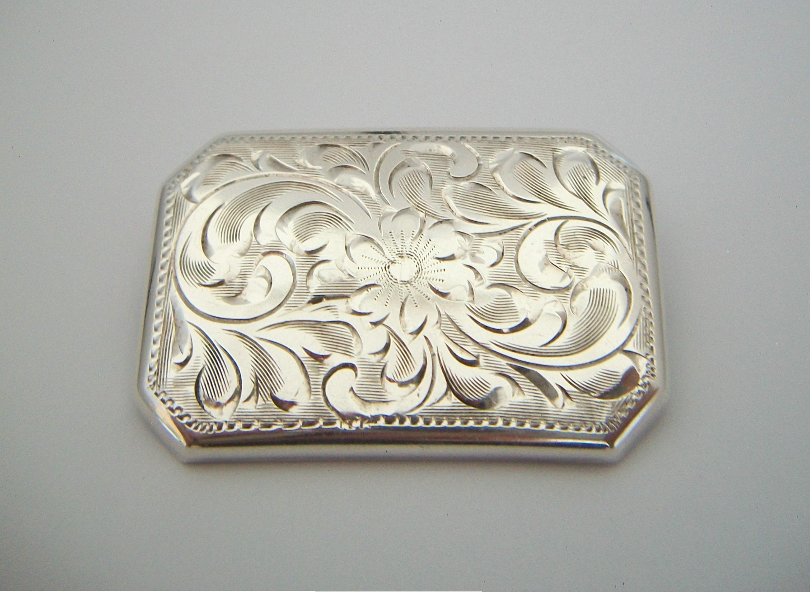 BURKHARDT (Manufacturer) - BIRKS (Retailer) - Vintage engraved sterling silver brooch - fine hand made quality - featuring a floral and scroll pattern - original pin and closure - signed on the back - Canada - circa 1950's.

Excellent / mint vintage
