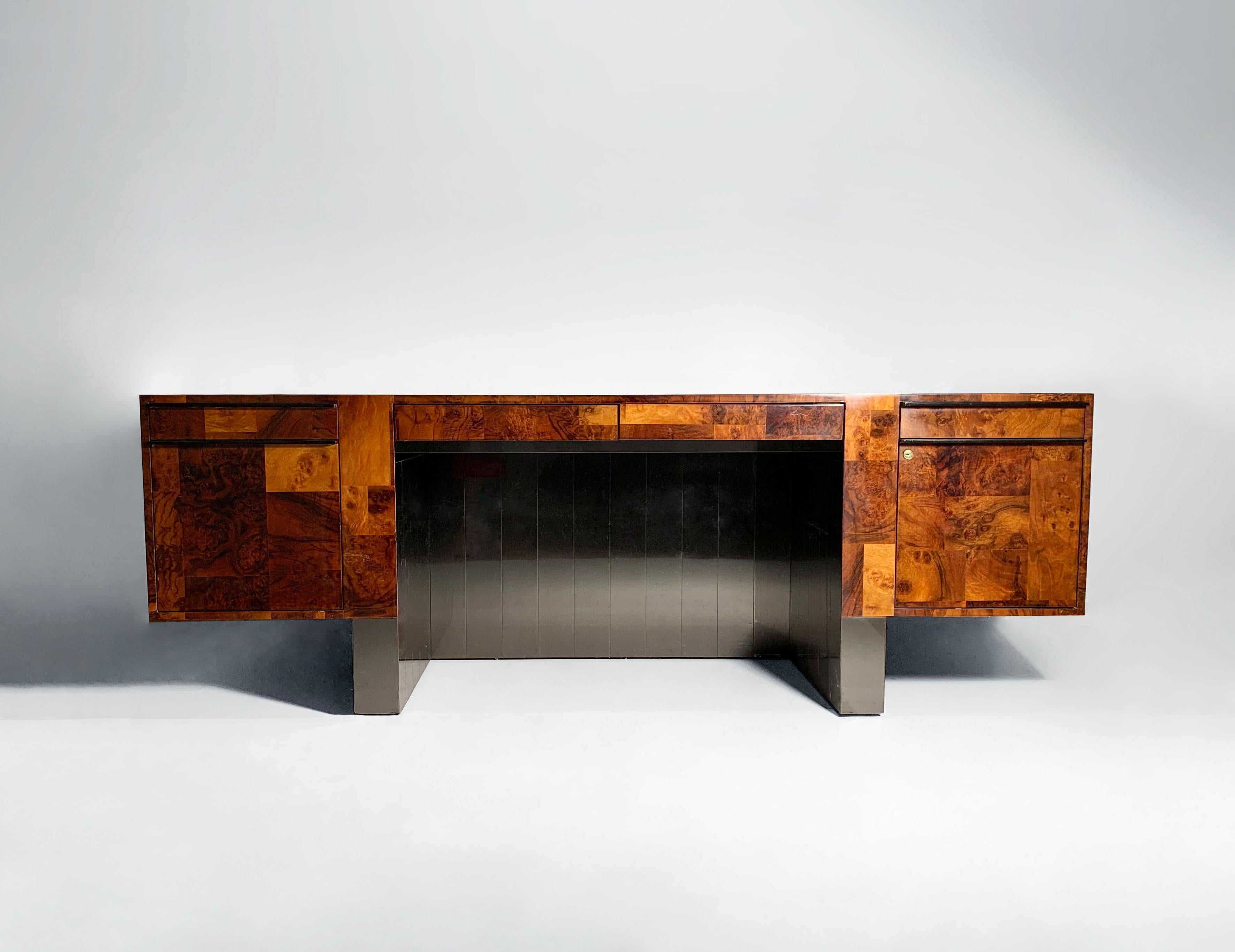 A period Paul Evans Desk in Cityscape Burl wood. In rather remarkable original condition minus some minor wear and tear that can easily be fixed.   Please request additional photos and condition report.