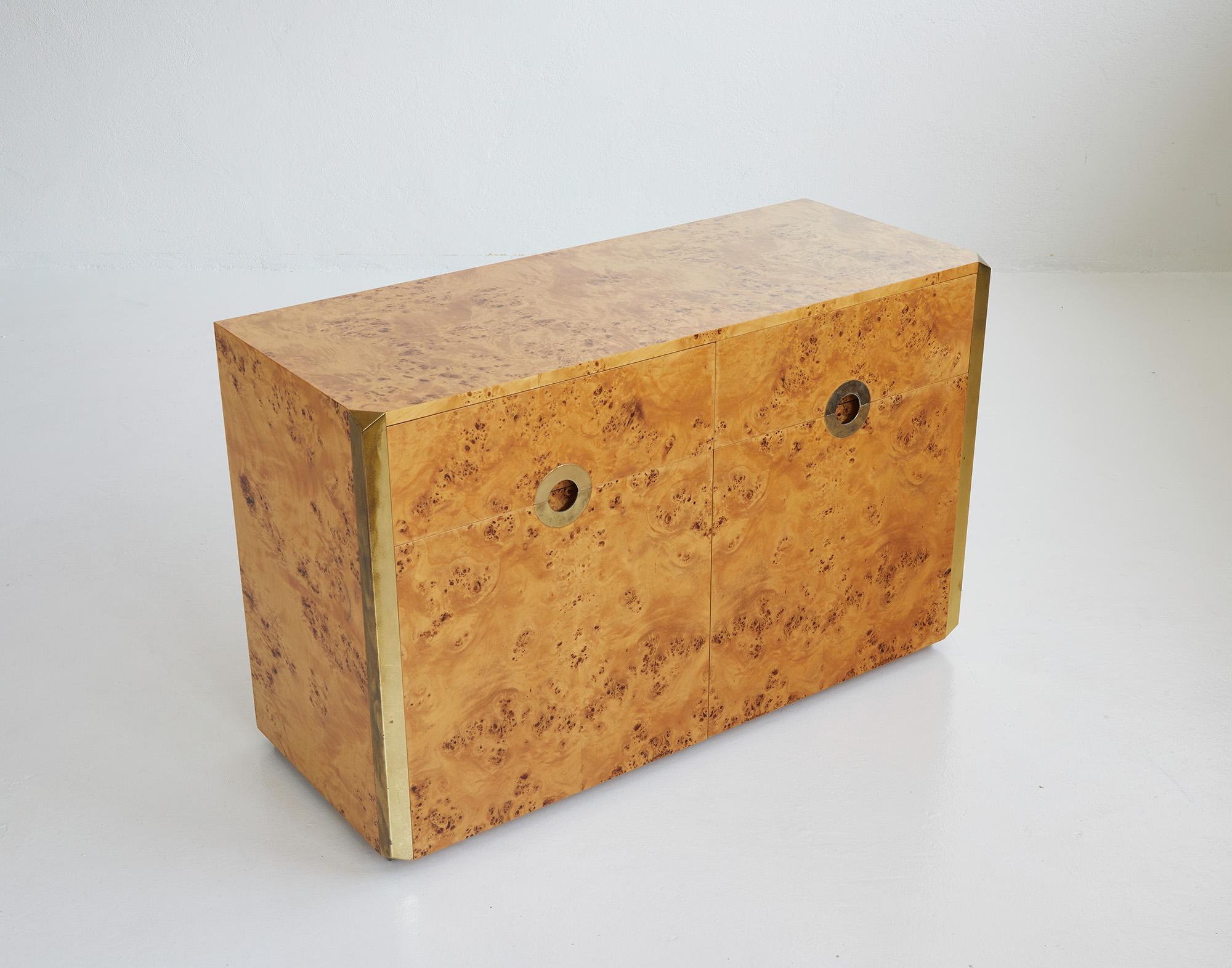 Burlwood and brass sideboard by Willy Rizzo, Ed.Mario Sabot 1970

The gorgeous credenza has been designed by the famous Italian fashion photographer turned designer Willy Rizzo.

This is the smaller version from the 