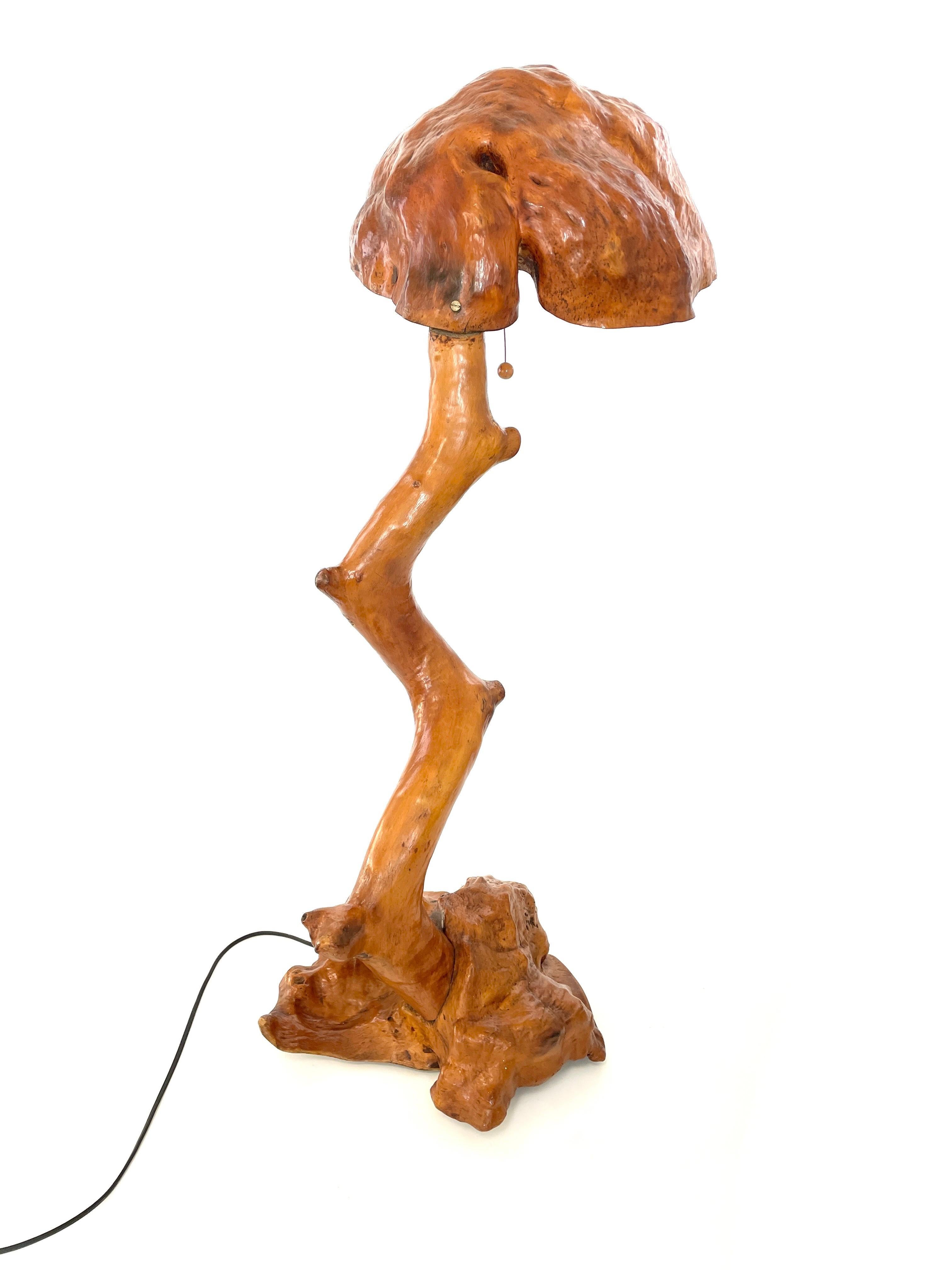 Brutialist Burl Lamp, designed and crafted by an accomplished yet unknown Finnish Artistic Craftsman in the 1930s. This unique lamp embodies the essence of nature, showcasing the rustic natural edge and preserving the organic irregularities and