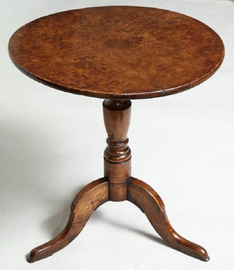 Fine Georgian tripod tilt-top table, the top fashioned from a single oak burl, over balustrade turned shaft and standing on shaped slipper feet, the whole possessing good rich color and the top with especially interesting burl figuring.