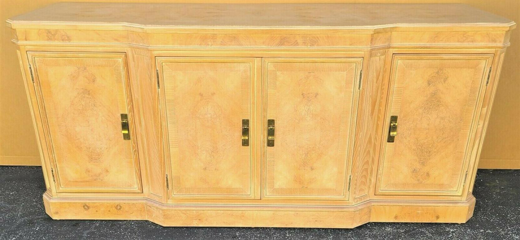 Heritage Corinthian Collection Blonde Light Burl Wood Credenza Sideboard Buffet
4 door cabinet with 2 shelves, 3 drawers, light burl wood finishes on the doors and top, and a tarnish-resistant felt-lined flatware top drawer. 

Coloration Report: