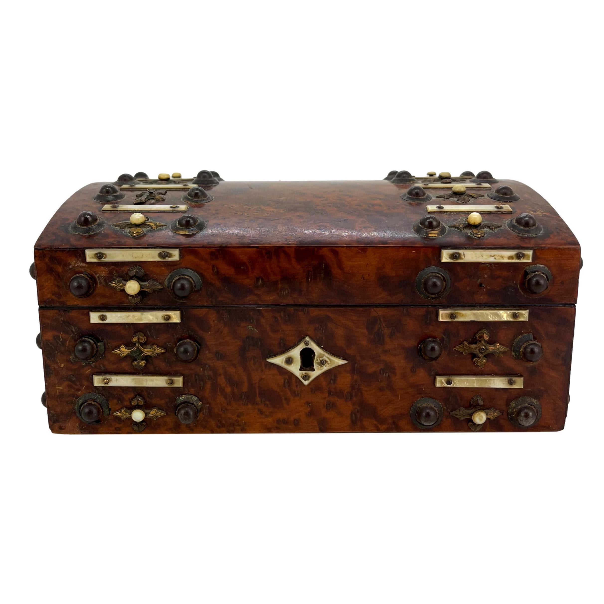 Burl walnut and engraved brass dome-sewing box with mother-of-pearl, English, ca. 1860.