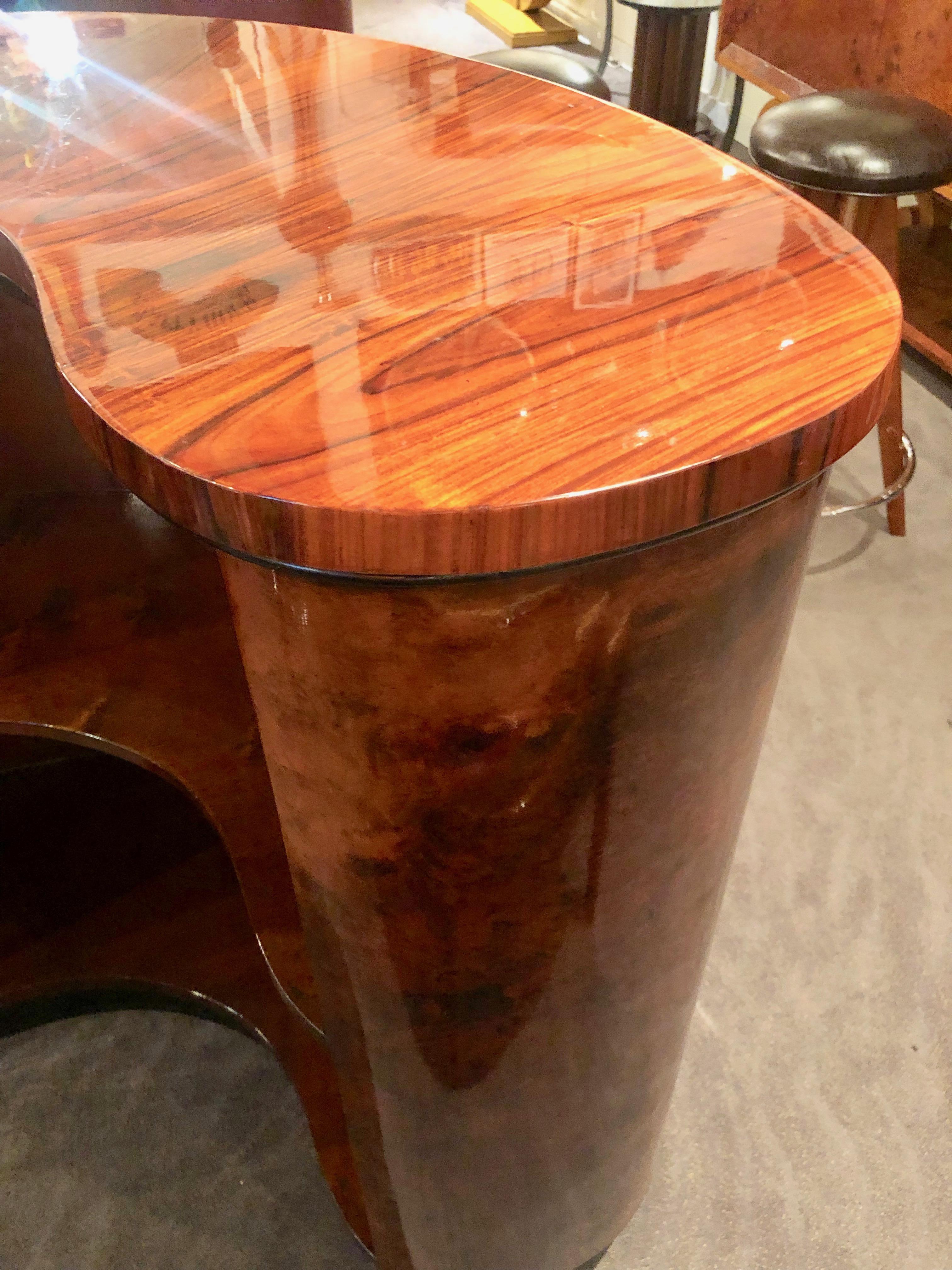 Burl walnut Art Deco round stand behind bar. Incredible bookmatched veneer wood with precision grain match to help create a one of kind home bar. Original vintage piece! Perfect size to fit anywhere in your home: living room, dining room, kitchen or