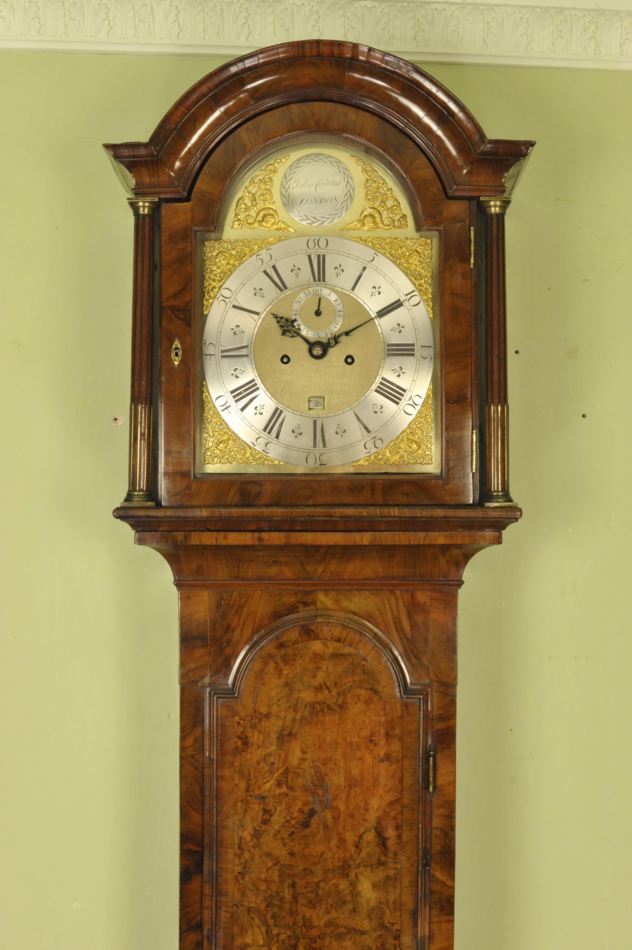 This is a very Fine walnut longcase clock dated circa 1740-50 by John Coates of London which is is outstanding condition
The 12 inch arched brass dial with finely matted centre , subsidiary seconds and date aperture is signed by the maker on a