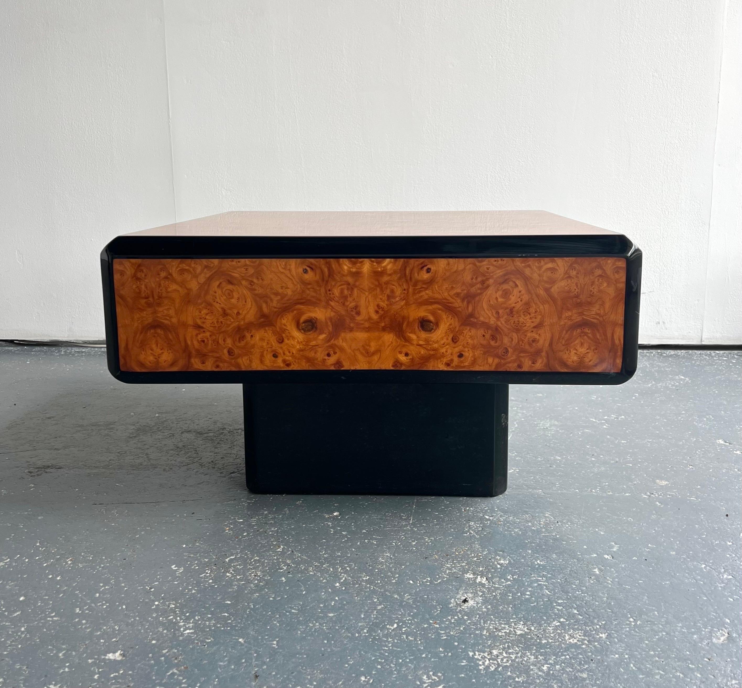 1980s Paul Michael Roche Bobois Style Coffee Table with burl wood and black lacquer.

A very chic small coffee table, perfect for a smaller living space made of burlwood with a lacquer finish. 

In very good condition, no obvious imperfections