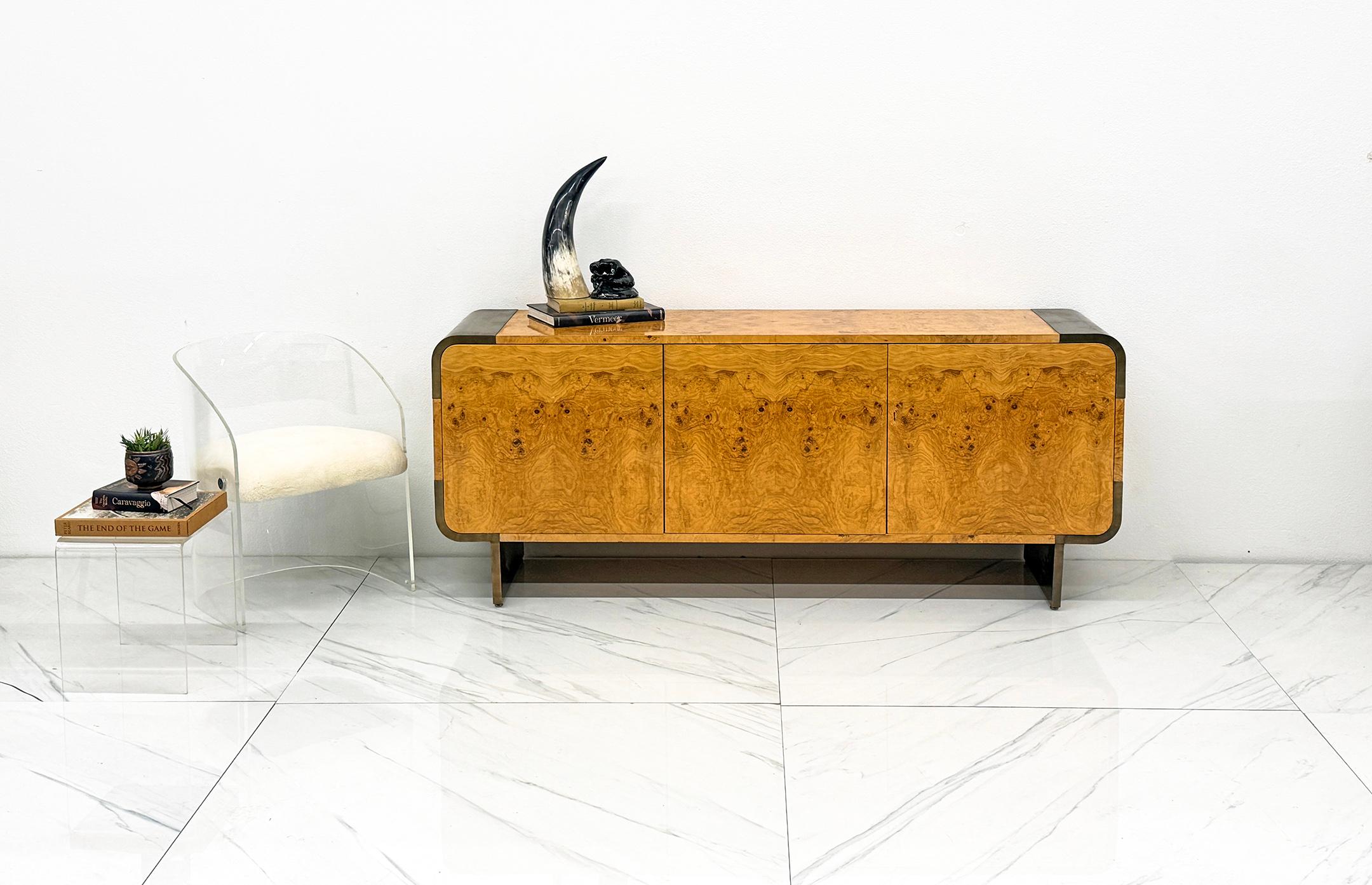 This credenza is absolutely stunning! A 1970's Pace Collection Credenza designed by Leon Rosen.

This credenza is a masterclass in '70s opulence, but with a grounded, versatile vibe. It's clad almost entirely in spectacular, richly figured,