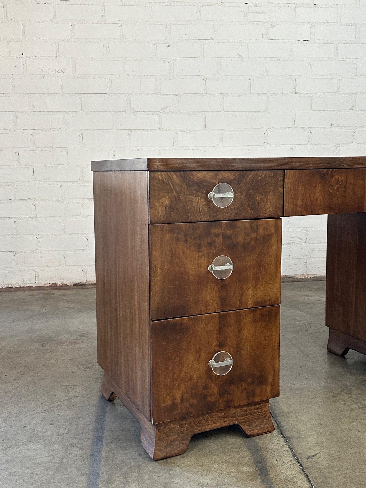 W51 D19 H29.5 KW21.5 KC23.5 KD18

Vintage Fully Restored Desk with a Medium Walnut Finish. Item is structurally sound and fully functional. Desk features very unique hardware and burl wood fronts. 