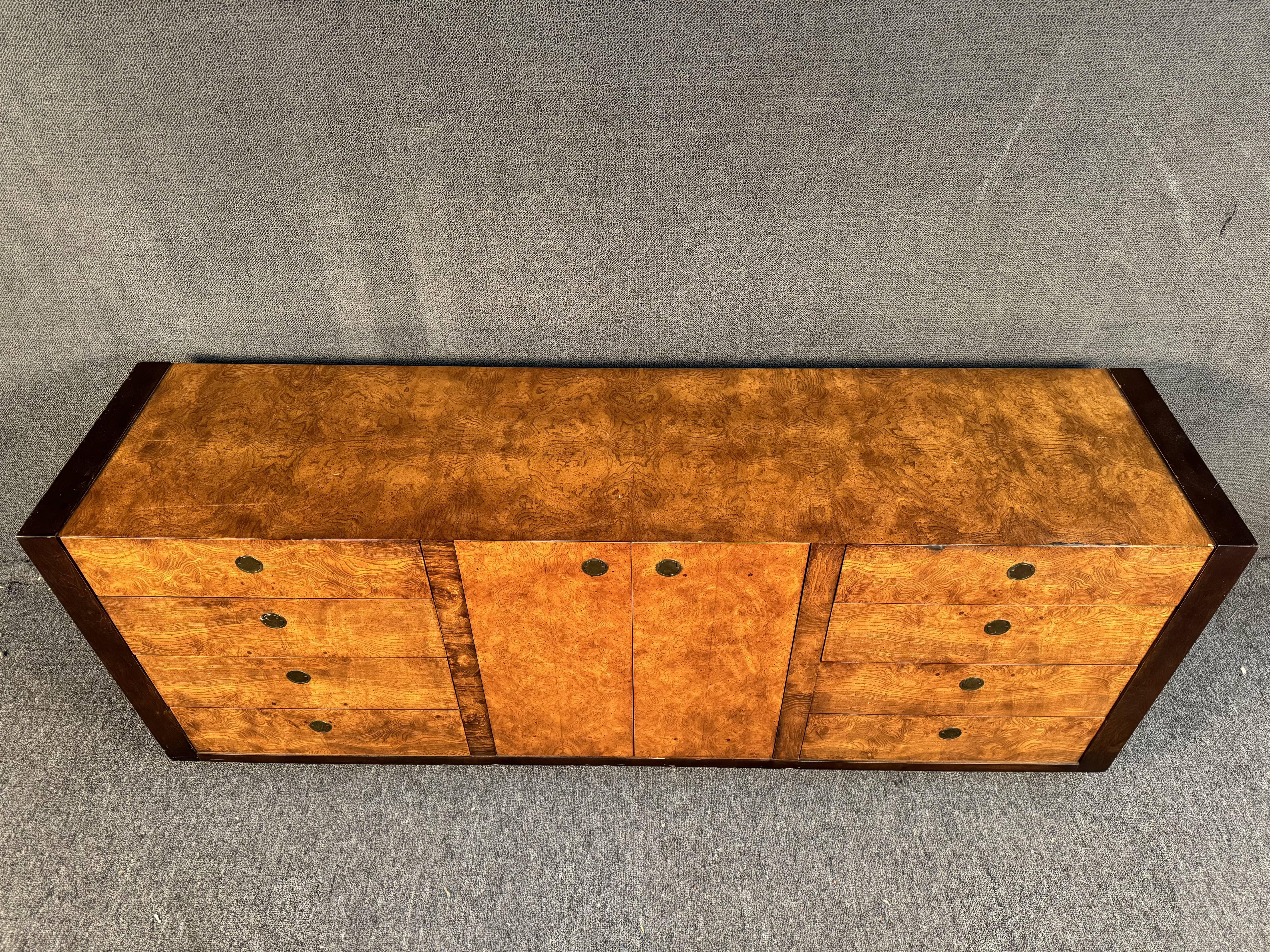 A Century Furniture dresser crafted from burl wood and mahogany with brass handles, featuring 12 spacious interior drawers. Please confirm location with seller (NJ or NY)
