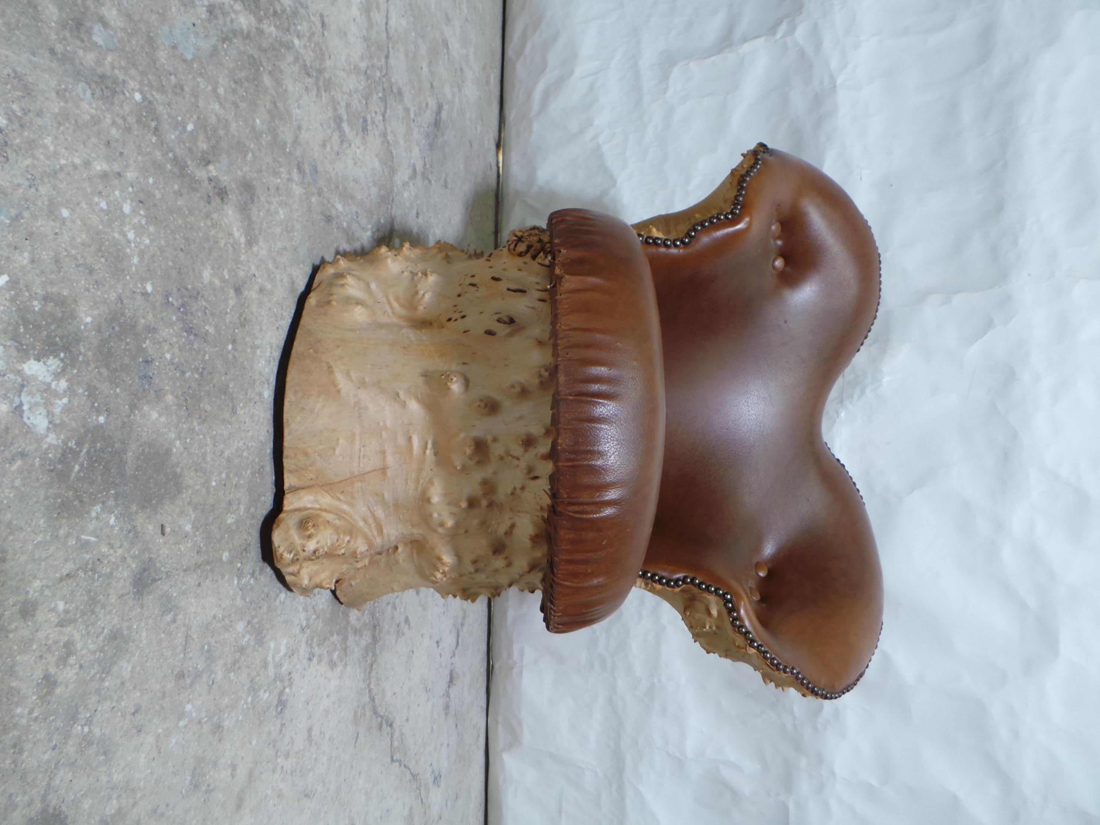 This is a Very unique Large Burl wood Chair. the inside has been hollowed out to lighten it up.