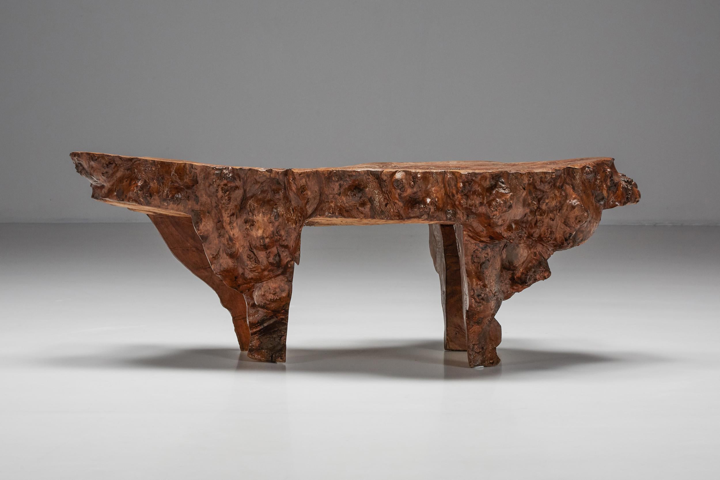 Burl Wood coffee table Wabi-Sabi, Japanese Design, mid-19th century. 

This wooden chair perfectly embodies the enduring Japanese concept of 'wabi-sabi'. Made from an ancient piece of wood characterized by significant fissures and gaps, the artist