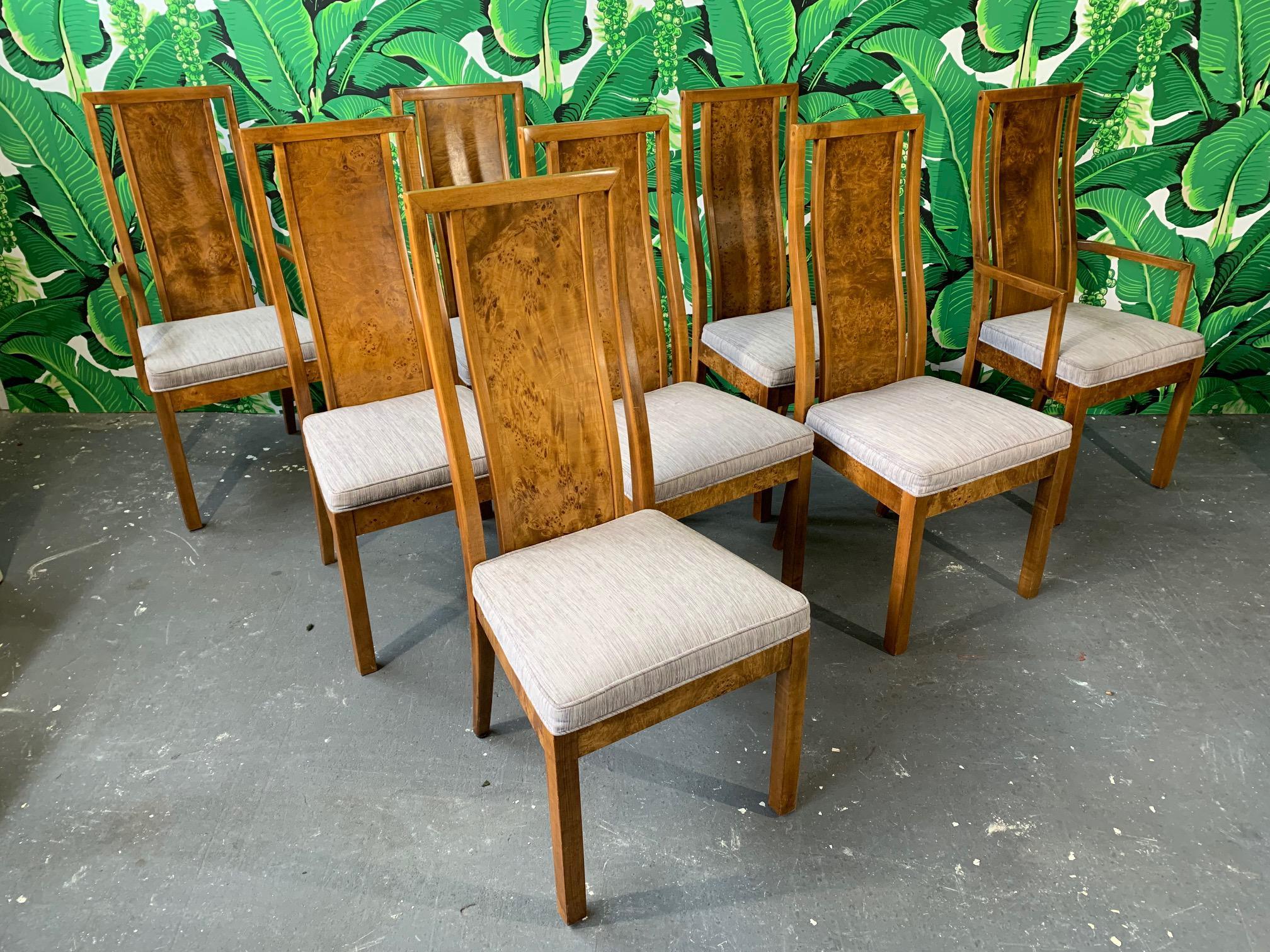 Set of eight burled elm wood dining chairs by Founders furniture for Thomasville, circa 1975. Includes 2 armchairs and 4 side chairs. Very good condition with only very minor signs of age appropriate wear.
Side chairs measure 19.5