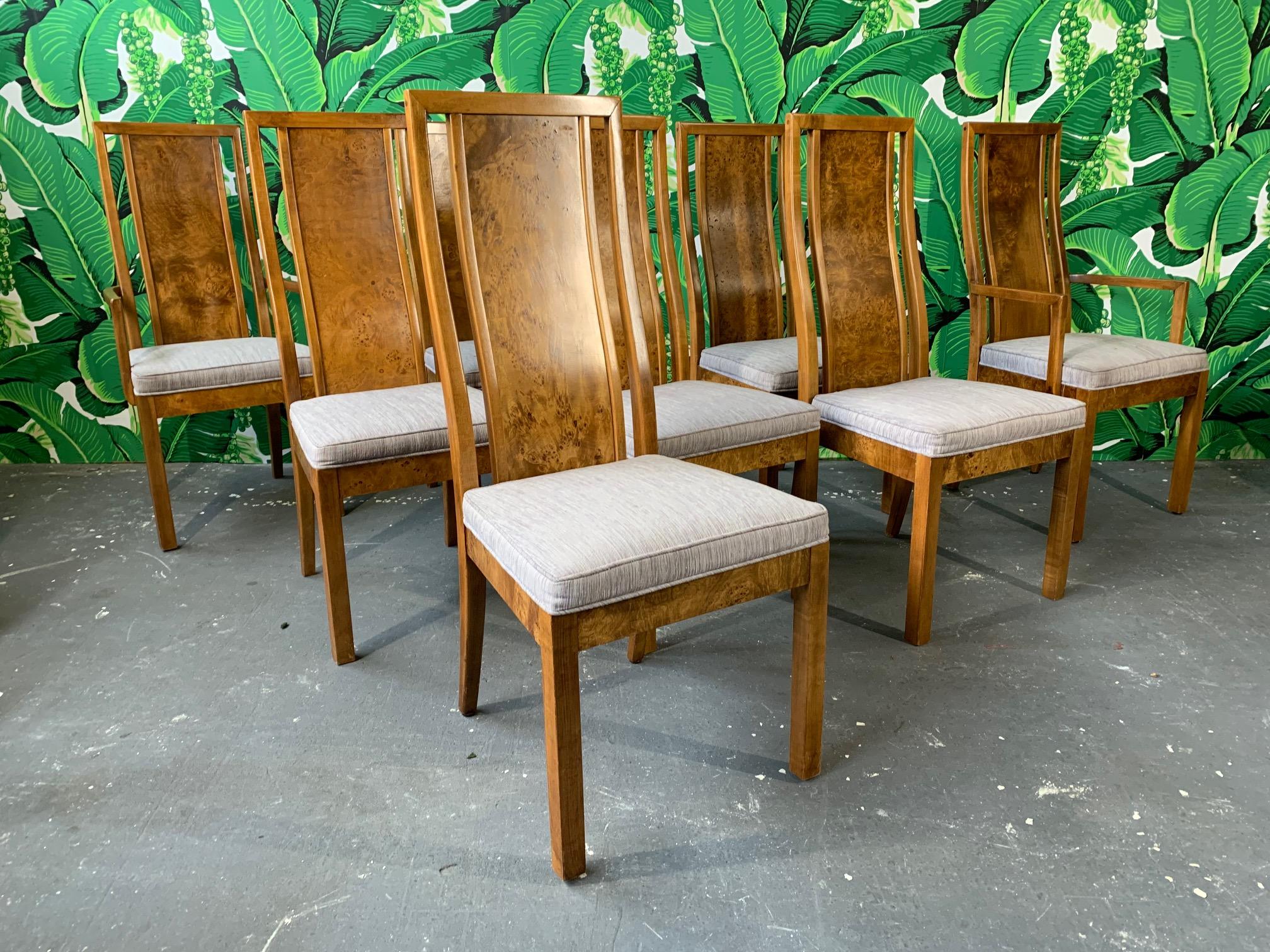 Set of eight burled elm wood dining chairs by Founders furniture for Thomasville, circa 1975. Includes 2 armchairs and 4 side chairs. Very good condition with only very minor signs of age appropriate wear.
Side chairs measure 19.5