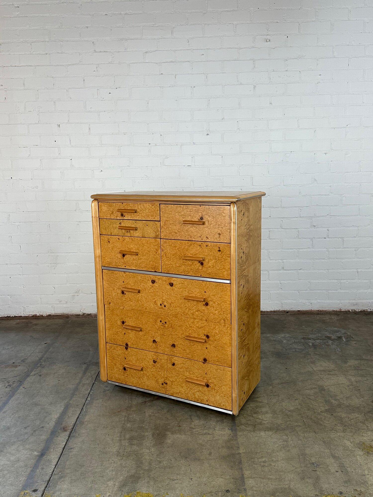 W38 D21 H50.5

Burl wood highboy by Lane in fully restored condition. Item features chrome accents and sits a plinth base for great stability.