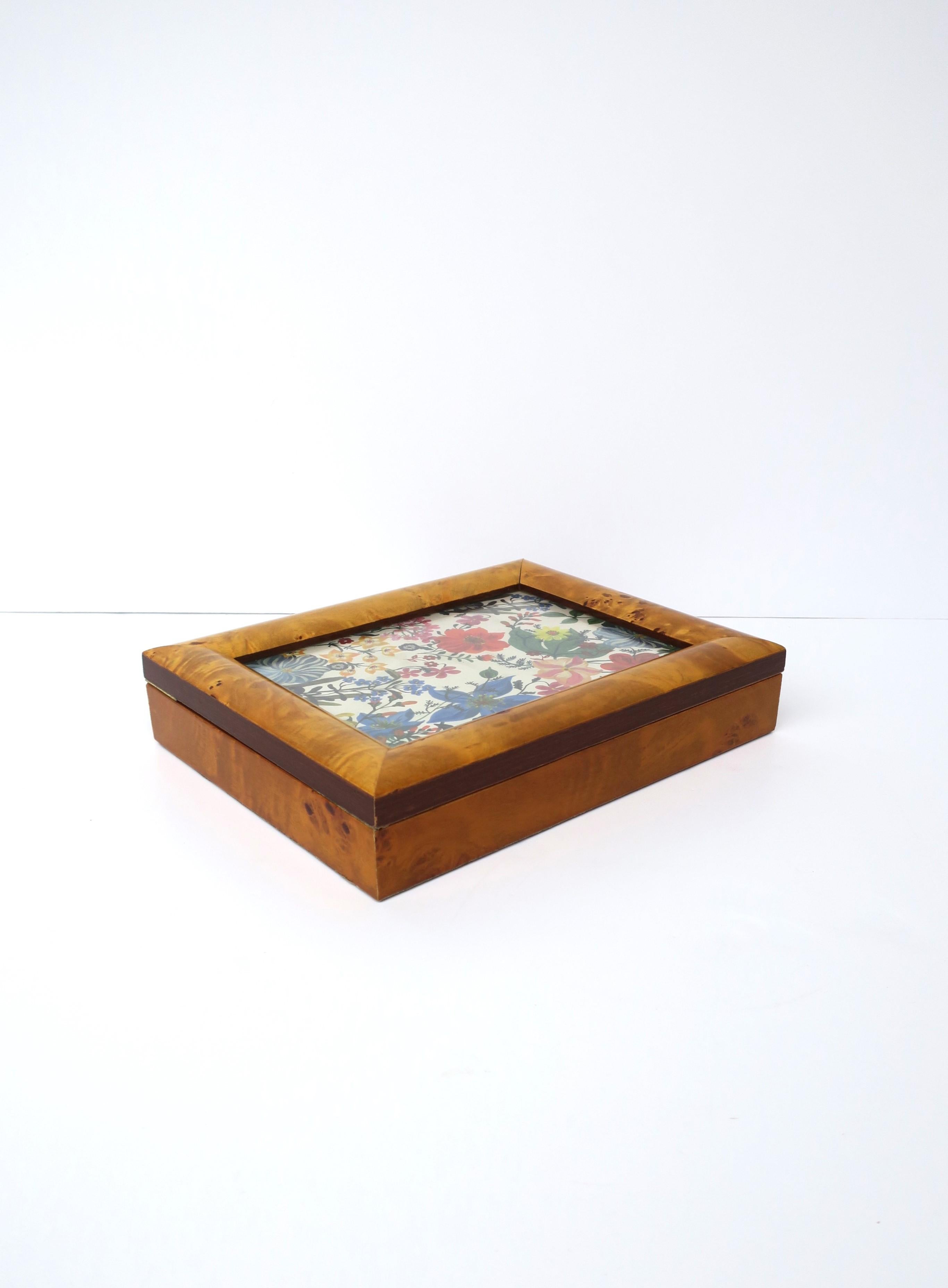 A burl wood box with picture frame/lid, circa mid-20th century. A beautiful box to hold jewelry for other items on a desk, vanity, sideboard, etc. Lid is a burl wood veneer, with brass hinge, also doubles as a picture frame (with glass protective