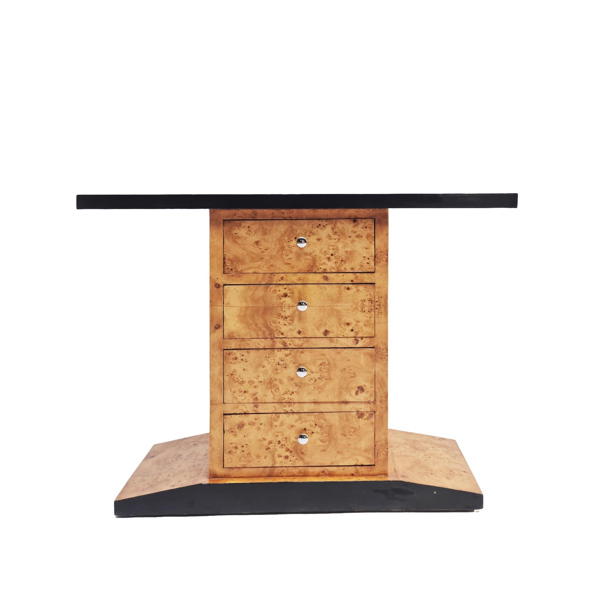 

This stunning piece features a burl wood veneer and black lacquered wood, reflecting the Art Deco revival style popular in the 1980s. With its elegant design, this console table or cabinet makes a striking statement in any interior.
