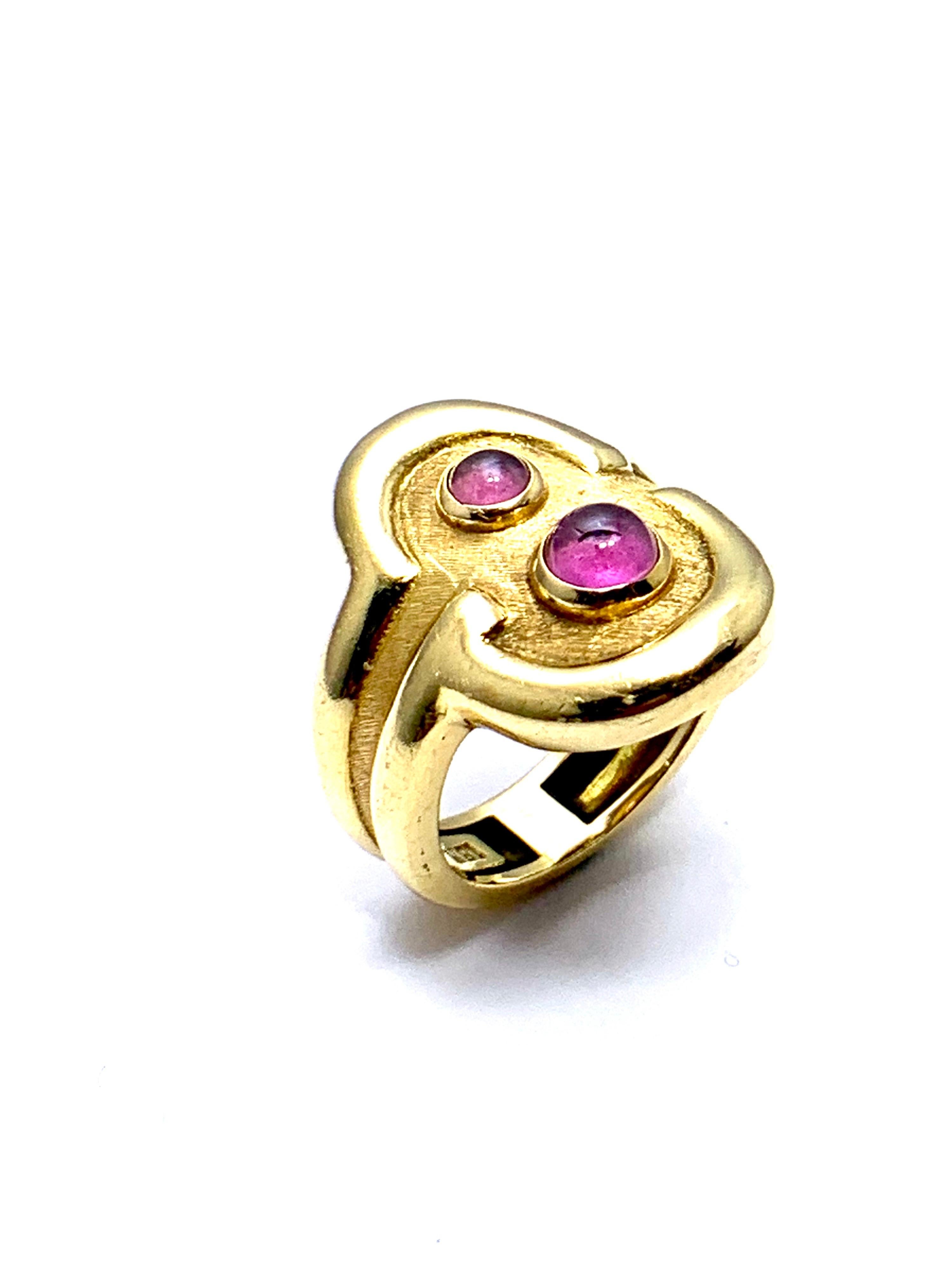 A beautiful Pink Tourmaline ring designed by Burle Marx. The 0.48 carat cabochon Pink Tourmaline displays a light pink hue, bezel set in an 18 karat yellow gold abstarct design ring. The inside shank is signed 