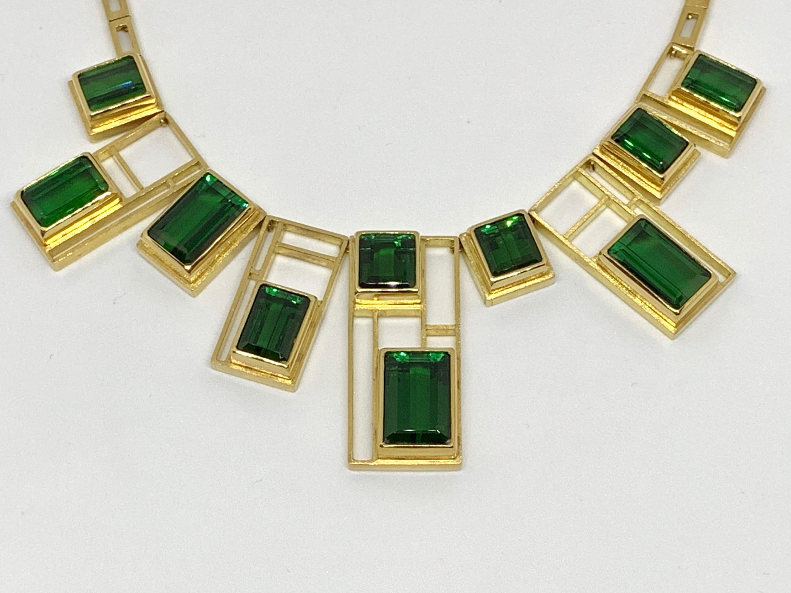Thanks for taking a look at this exceptionally rare Burle Marx Green Tourmaline Necklace. This stunning necklace has 11 perfectly matched Tourmalines totaling 117 carats, and has 119.25 grams of gold. The tourmalines in this piece came out of the