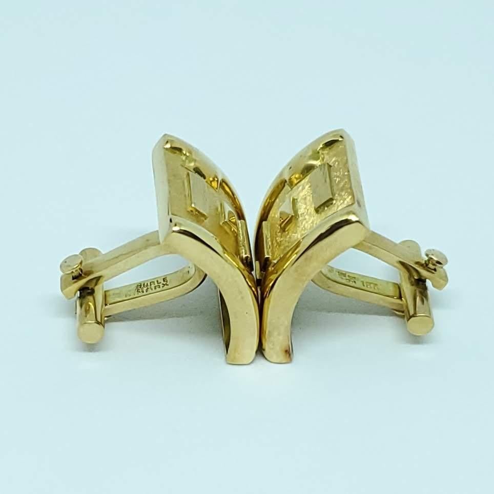 Thanks for taking a look at thes Burle Marx Cufflinks. They are approximately .84 inches high by .75 inches wide. They weigh 21 grams. Cufflinks are considered a rarity in the world of Burle Marx jewels, because people just don't often sell them,