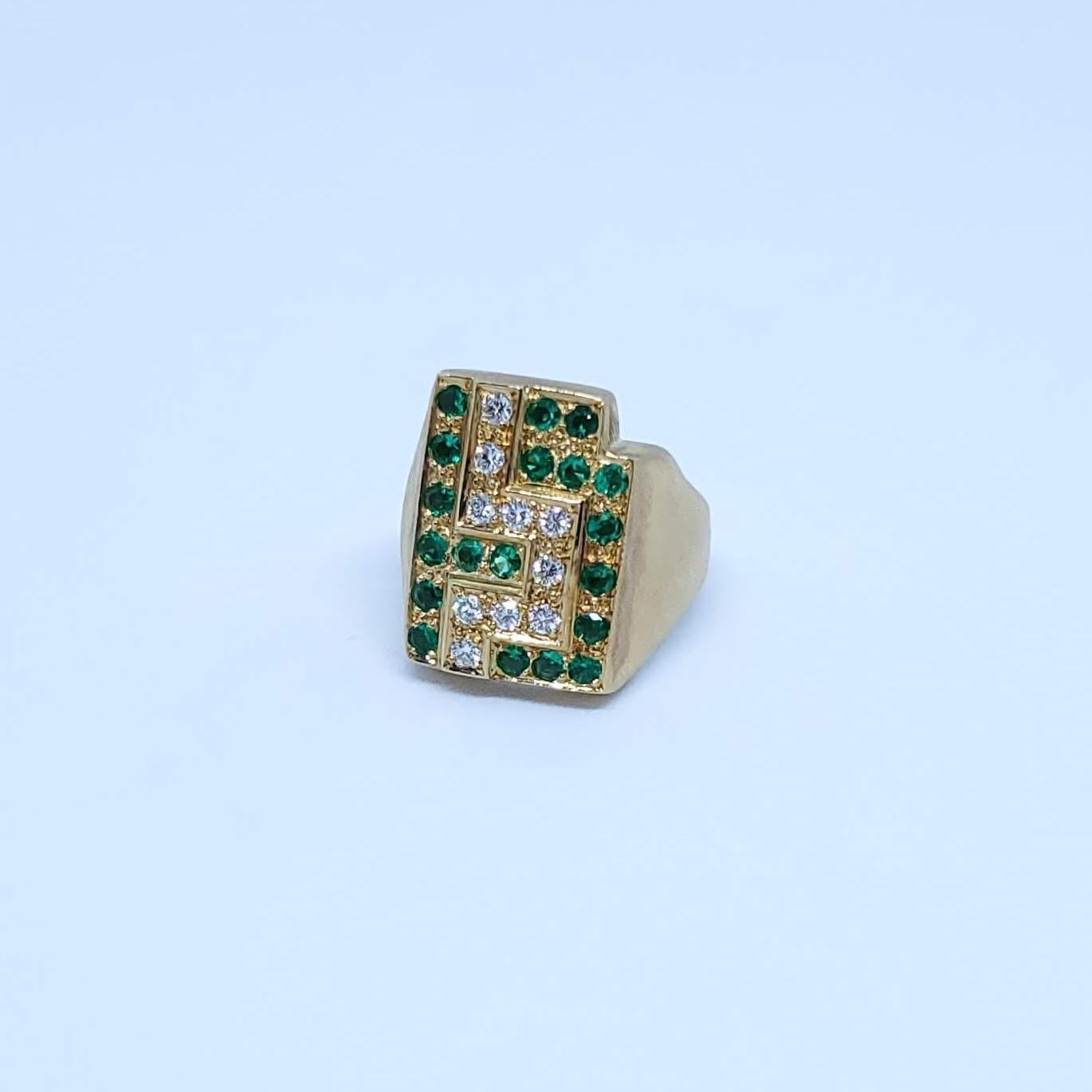 Thanks for taking a look at this Burle Marx Emerald and Diamond Ring. It has 10 diamonds, and 19 emeralds. It is a size 6.5, and can be sized up or down up to 2 sizes. The face of the ring measures .70 inches H by .53 inches W. 

Burle Marx, without