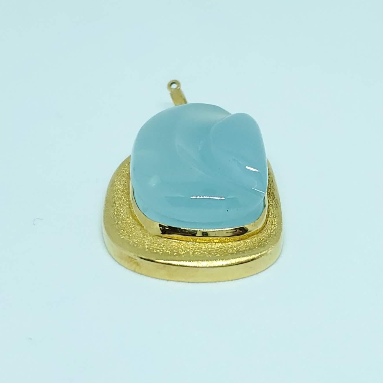 Thanks for taking a look at this Haroldo Burle Marx Free Form Aqua Pendant. This beautiful aquamarine is 48 carats and is surrounded by 18 Karat Gold. The face of the Stone is 1.16 inches by .80 inches. The overall size is 1.47 inches by 1.07