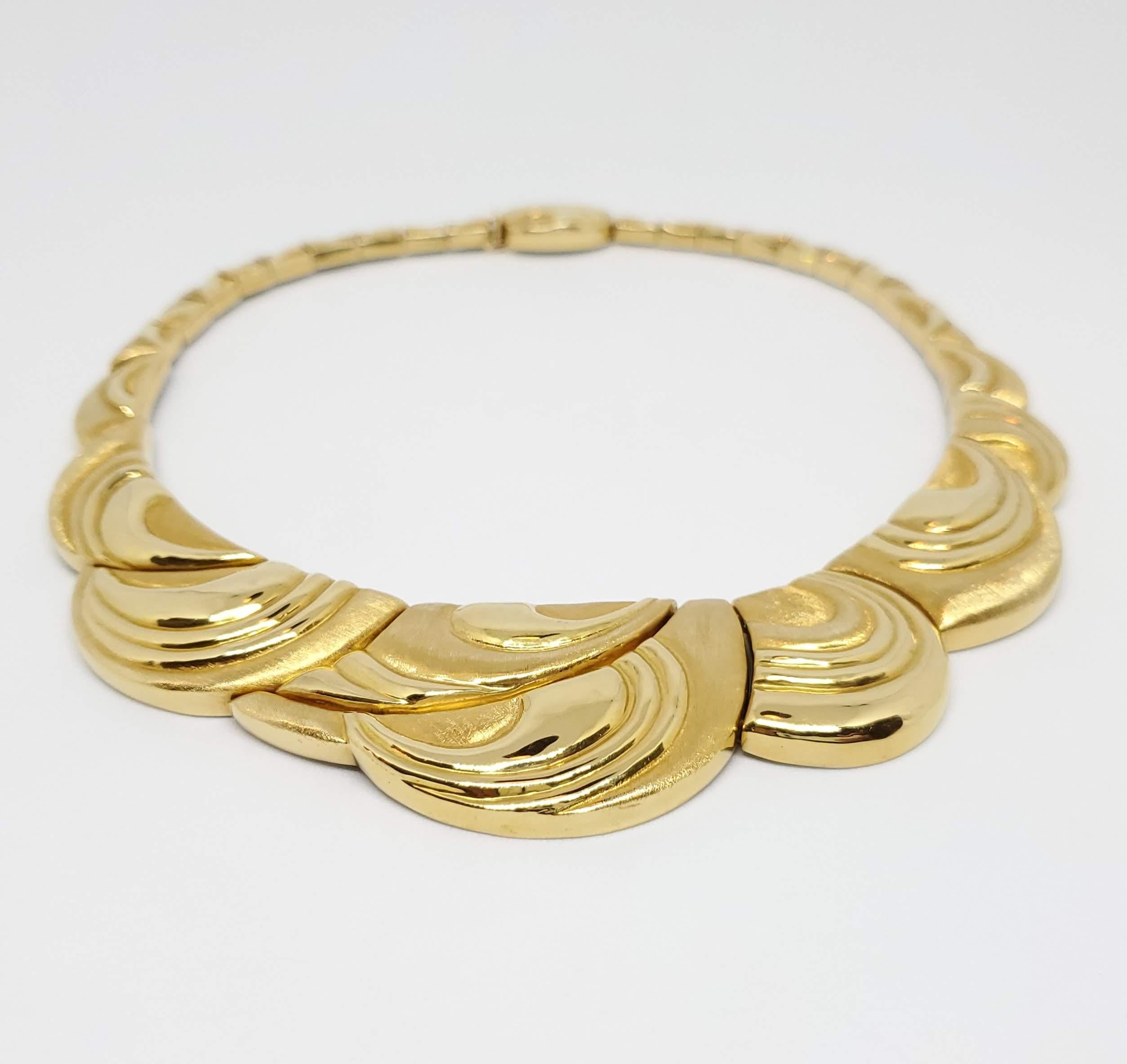 Thanks for taking a look at this Burle Marx 18 Karat Gold Necklace. This necklace has 104 grams of gold, and a matching bracelet (Sold Seperately) is available. It is 15