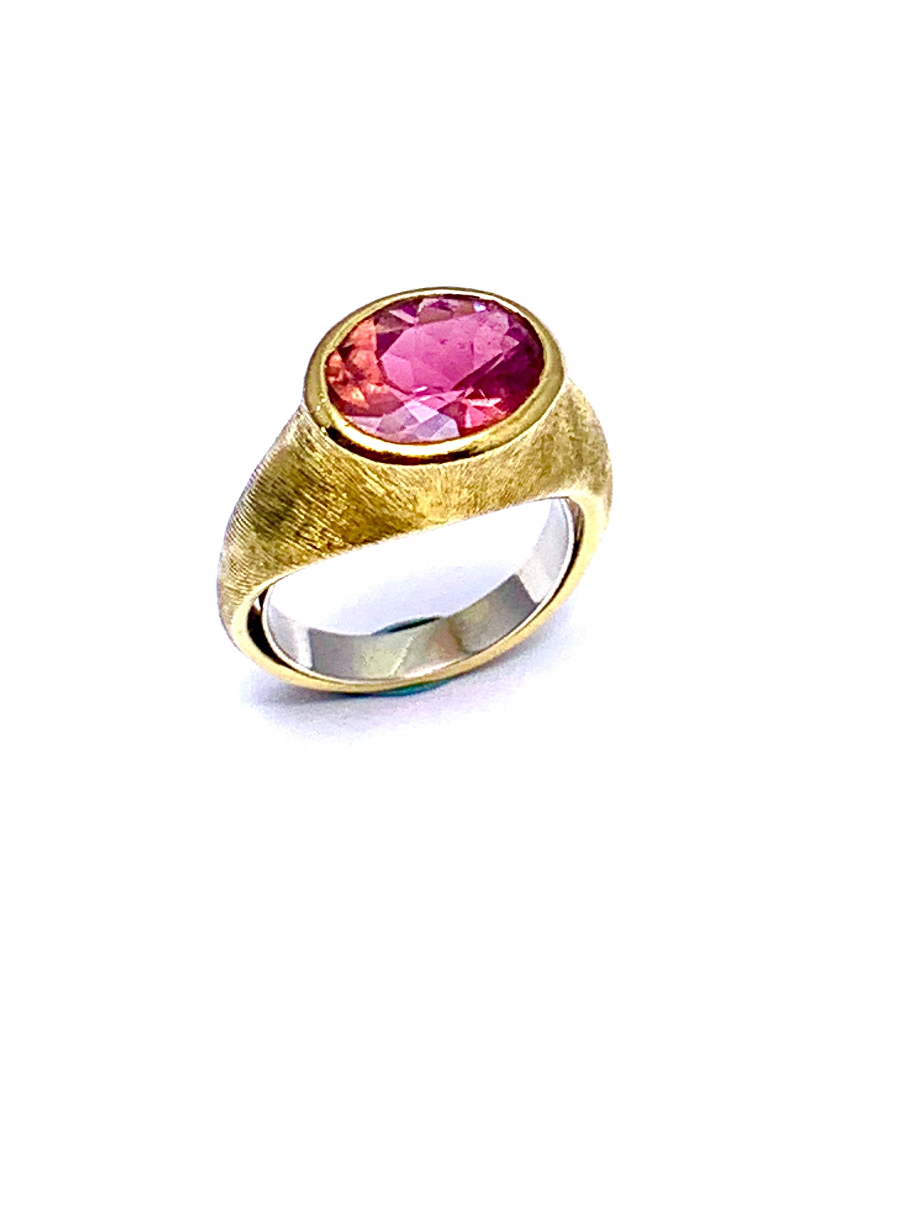 A beautiful Pink Tourmaline ring designed by Burle Marx. The 3.57 carat faceted oval Pink Tourmaline displays a light pink hue, bezel set in an 18 karat yellow gold abstarct design ring. The inside shank is signed 