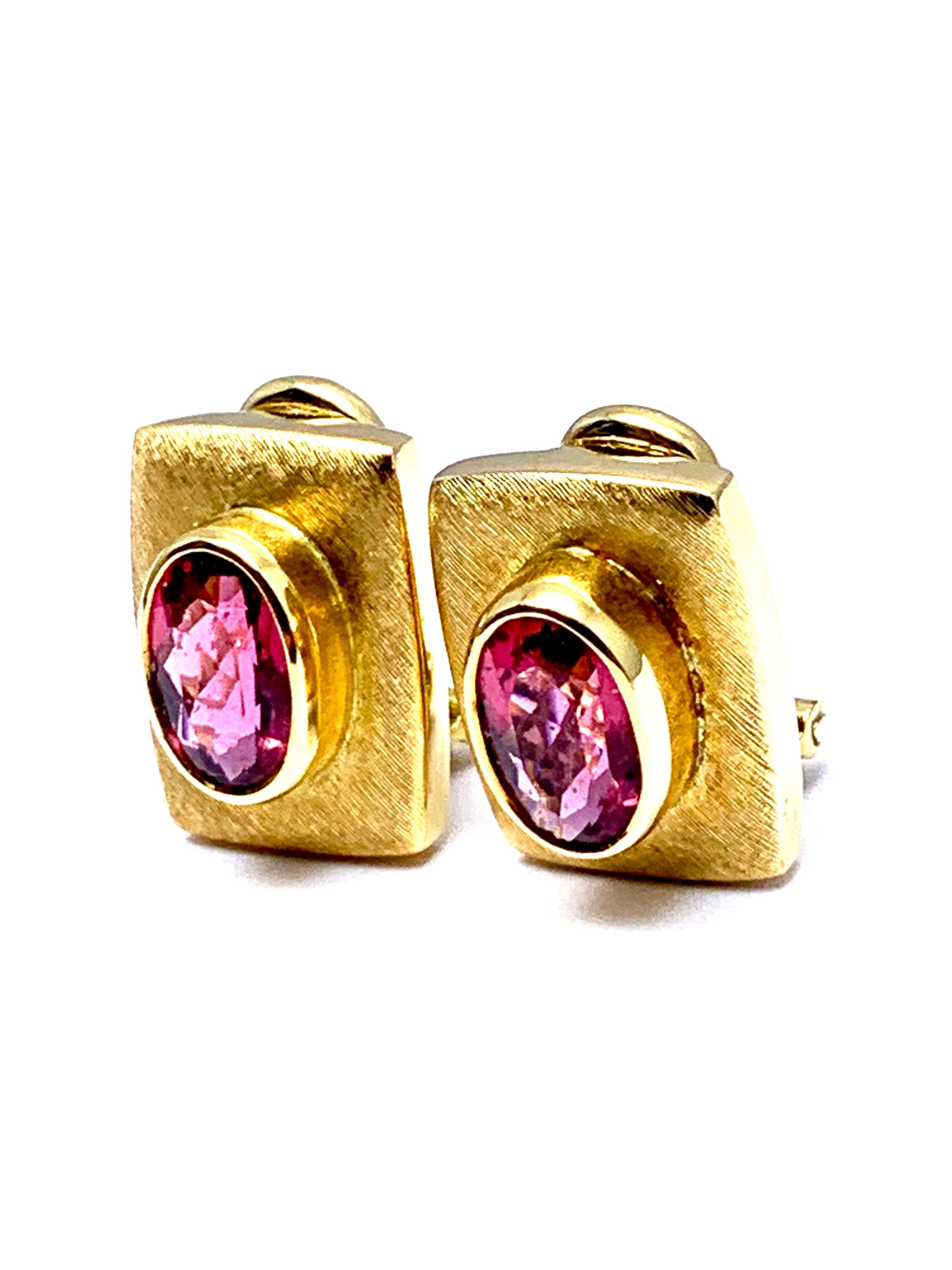 A beautiful Pink Tourmaline earrings designed by Burle Marx. The 3.89 carat faceted oval Pink Tourmaline displays a light pink hue, bezel set in an 18 karat yellow gold abstarct design earrings. The backs of the earrings are signed 