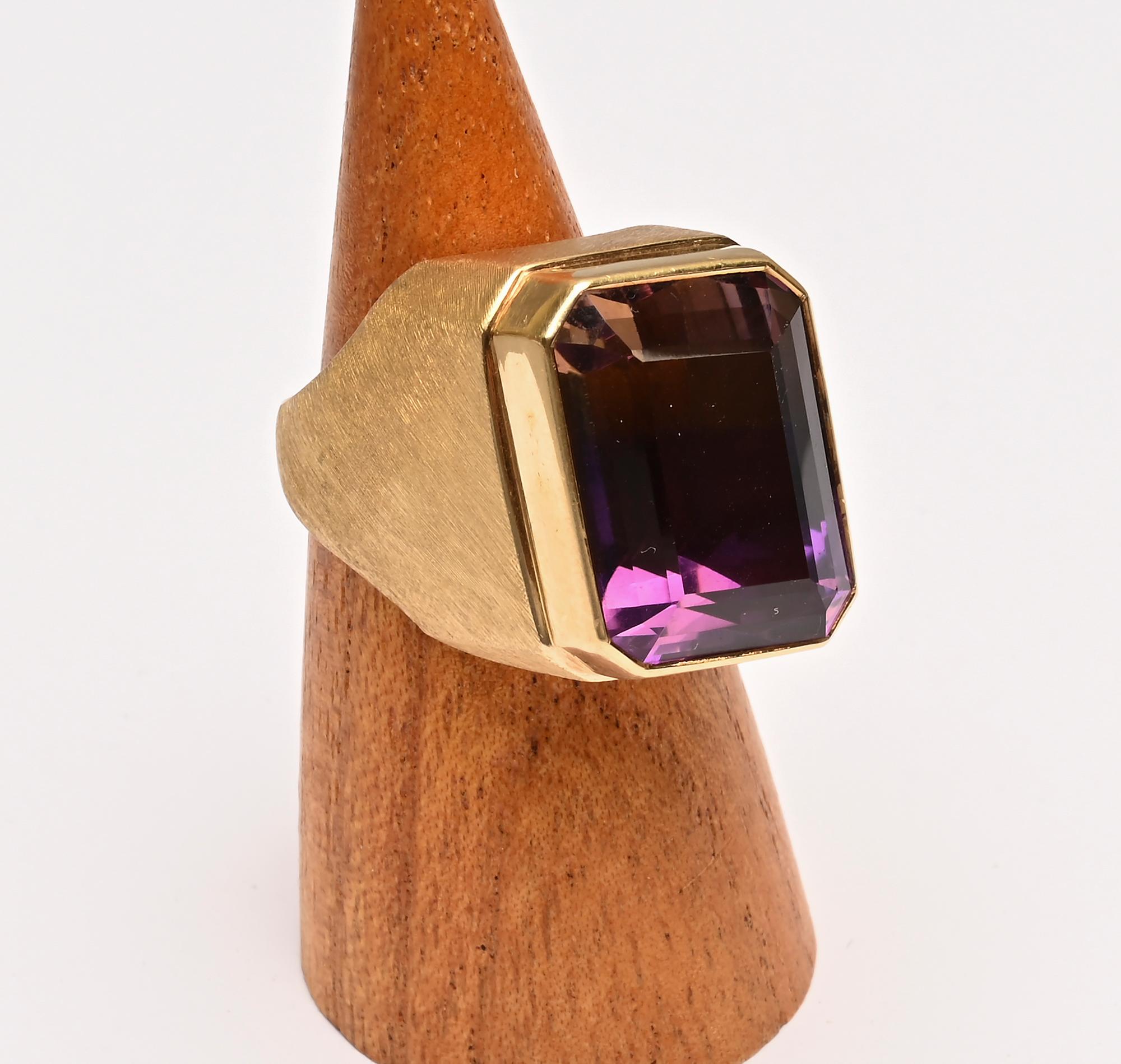 This stunning ring by Brazil's famous jeweler, Roberto Burle Marx is made with two unusual features. The stone is ametrine, a combination of amethyst and citrine that is found in nature. Second is that the stone is in the shape of a parallelogram.