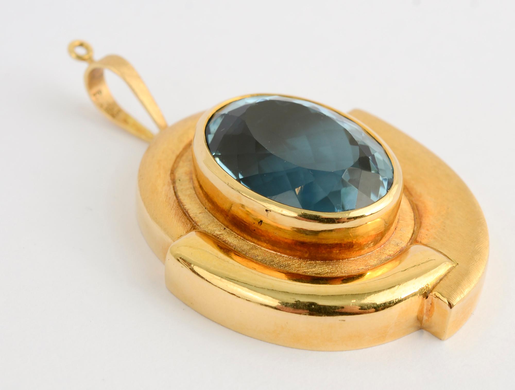 Beautiful and bold blue topaz pendant by Brazilian designer, Haroldo Burle Marx.
The faceted stone measures 7/8