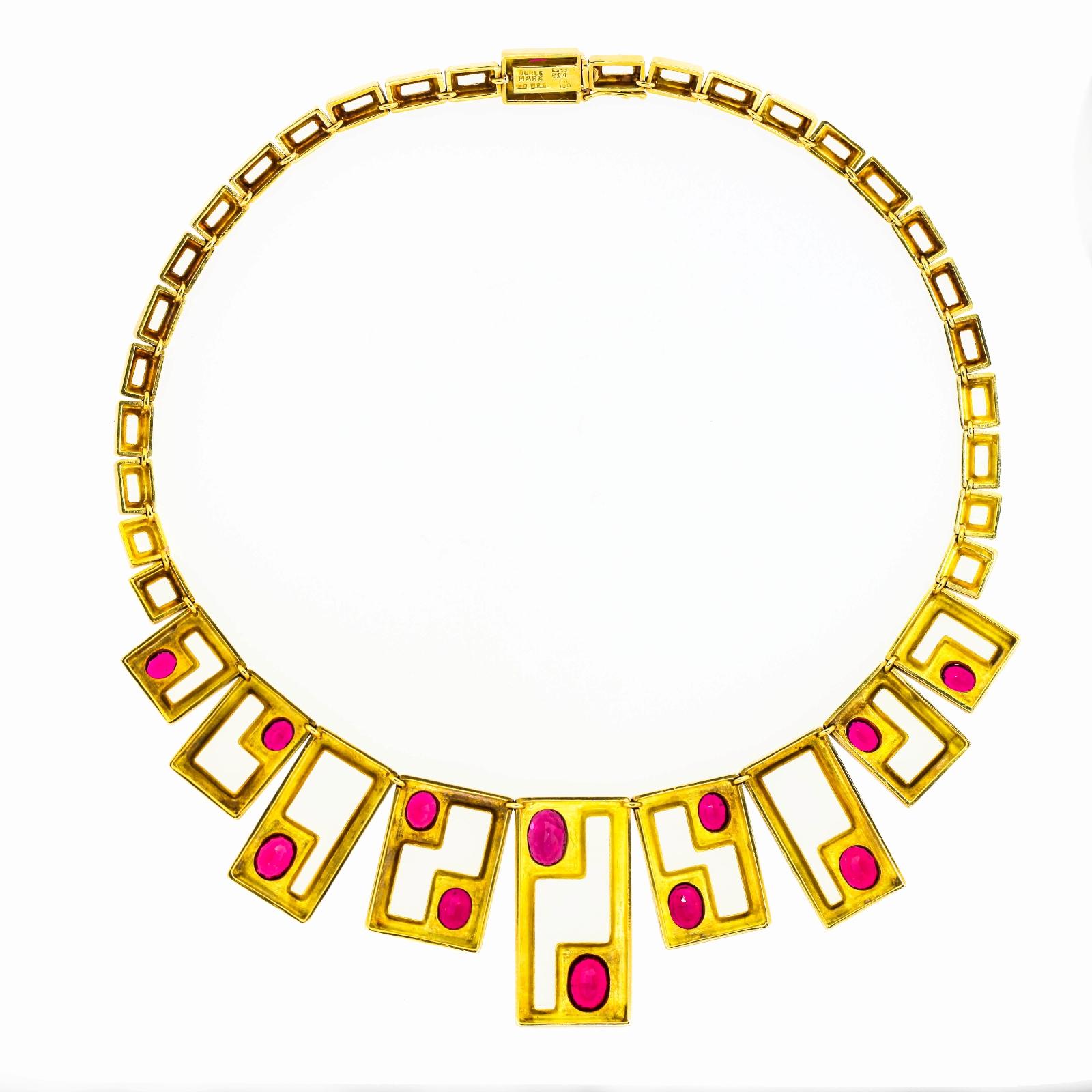 Vintage 18KT yellow gold necklace from the distinguished Brazilian designer Haroldo Burle Marx.  The geometrical design necklace is set with twelve and one in the clasp oval cut Rubellite Tourmaline gems weighing approx. 12.5 carat.  The hand made