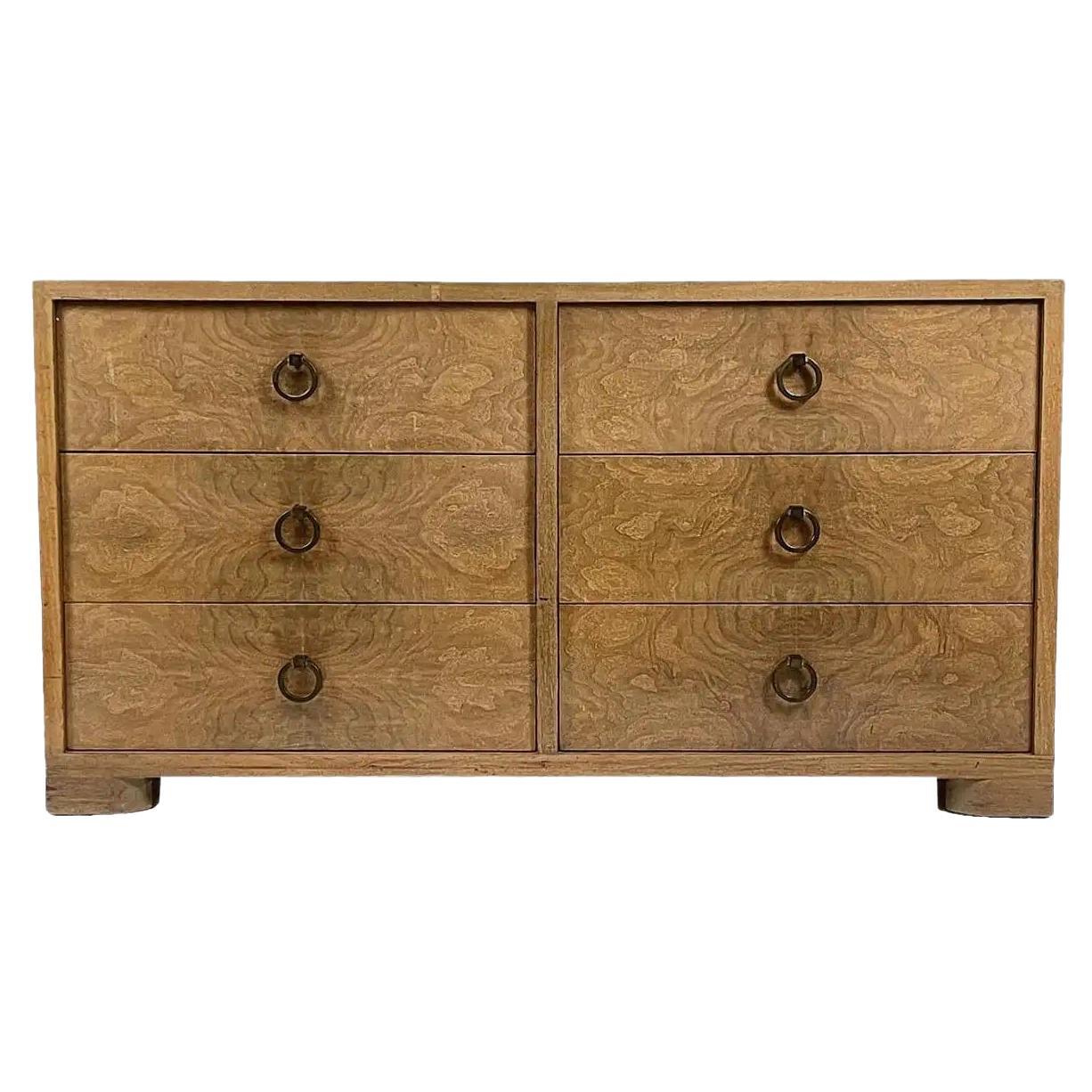 All original 1950s dresser by Red Lion Firniture. Stunning burled mahogany drawer fronts with elegant brass ring pulls. Solid wood with mahogany case. Sculpted feet complete the look of this American Art Deco piece. Glorious rich tones and action