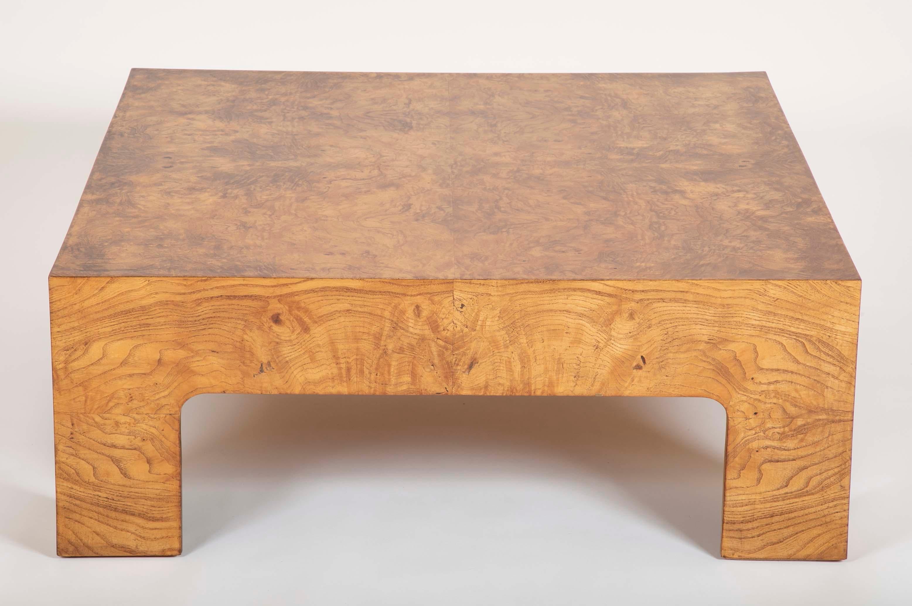 A Parsons style burled elm coffee table in the manner of Milo Baughman.