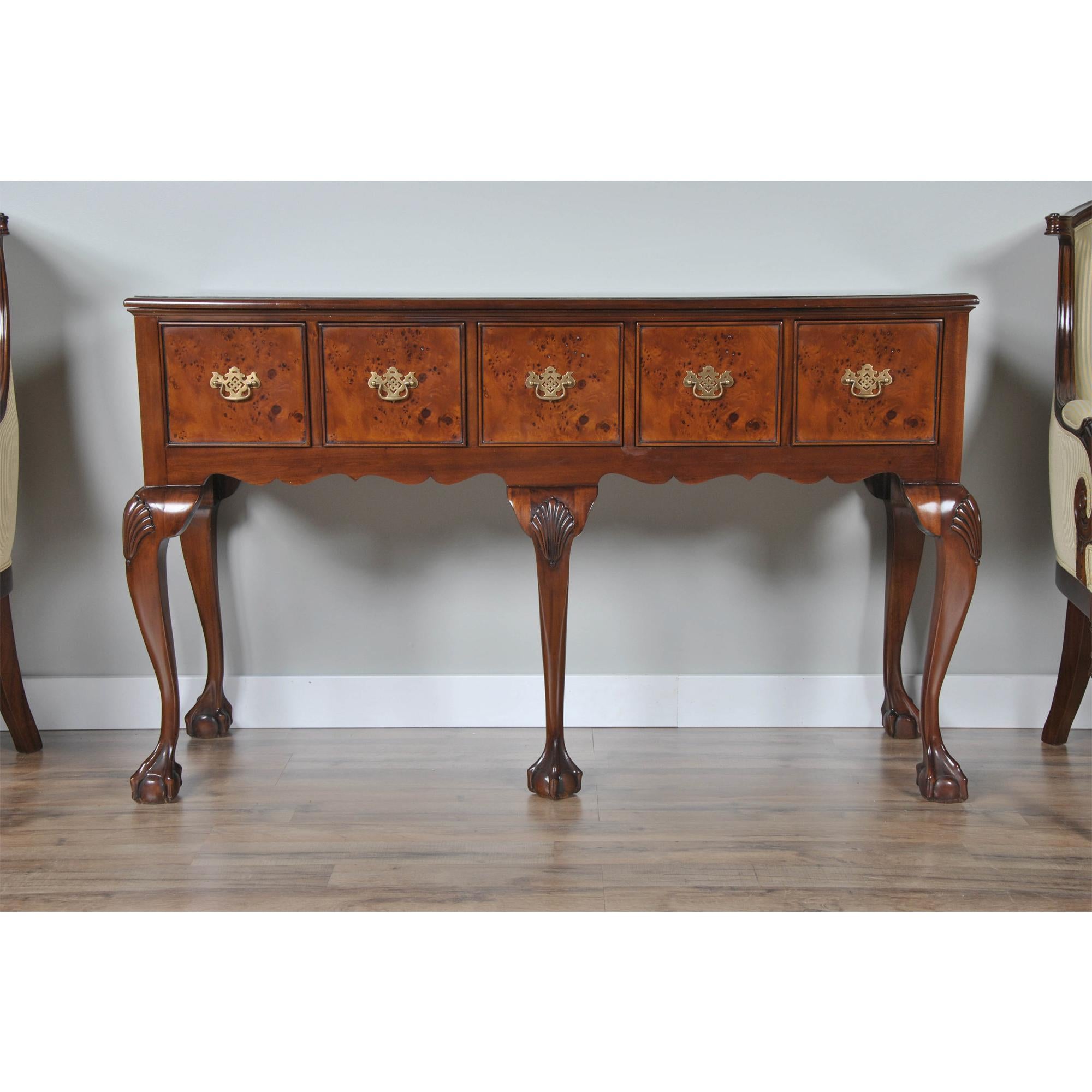 The Burled Hunt Board.  This classic style of sideboard or buffet is often also referred to as a hunt board, especially in the southern United States and England as it was narrow enough to be used in hallways. Narrow in depth the raised leg