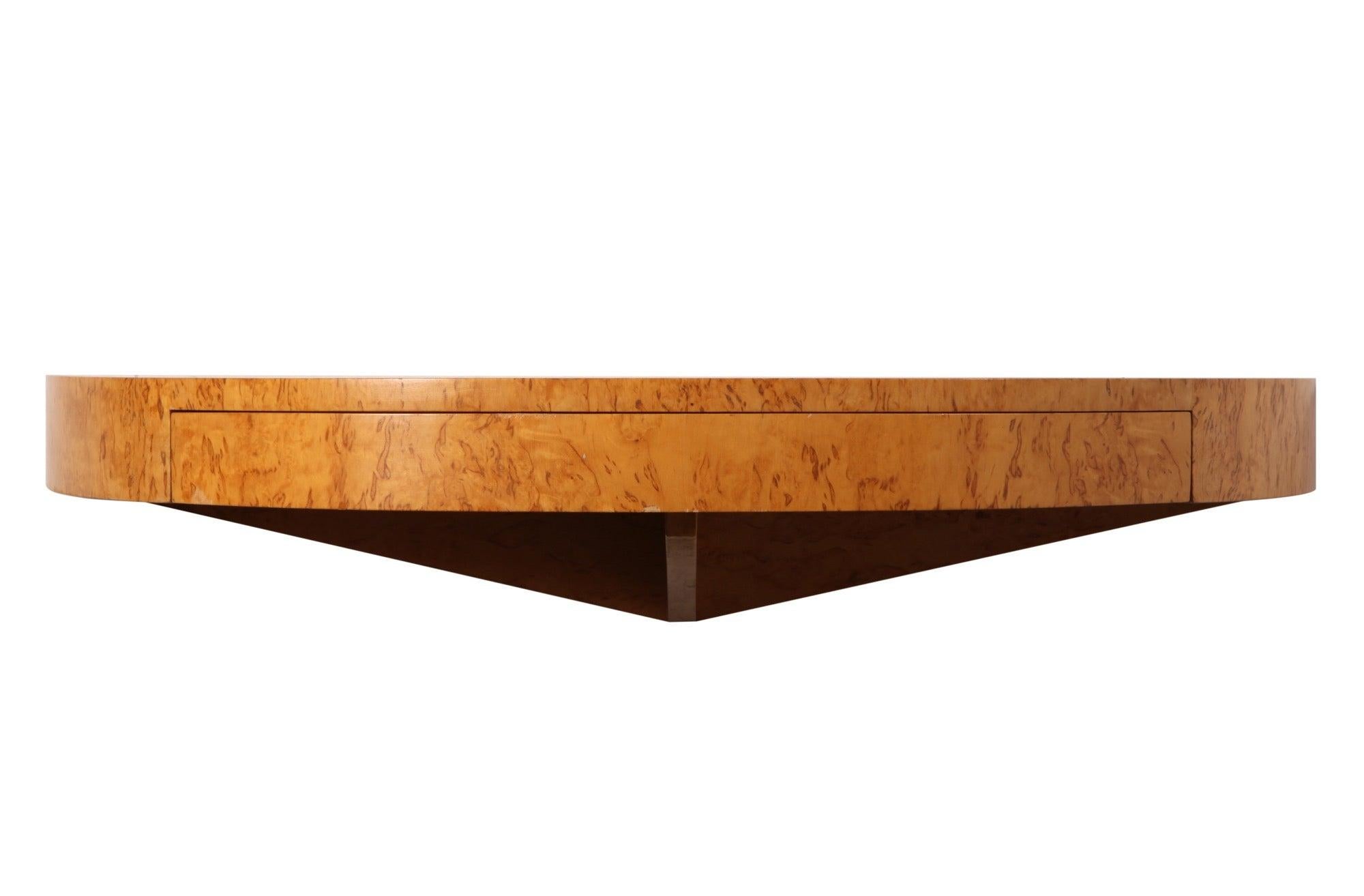 Burled Finnish birch demi-lune wall shelf with single drawer.