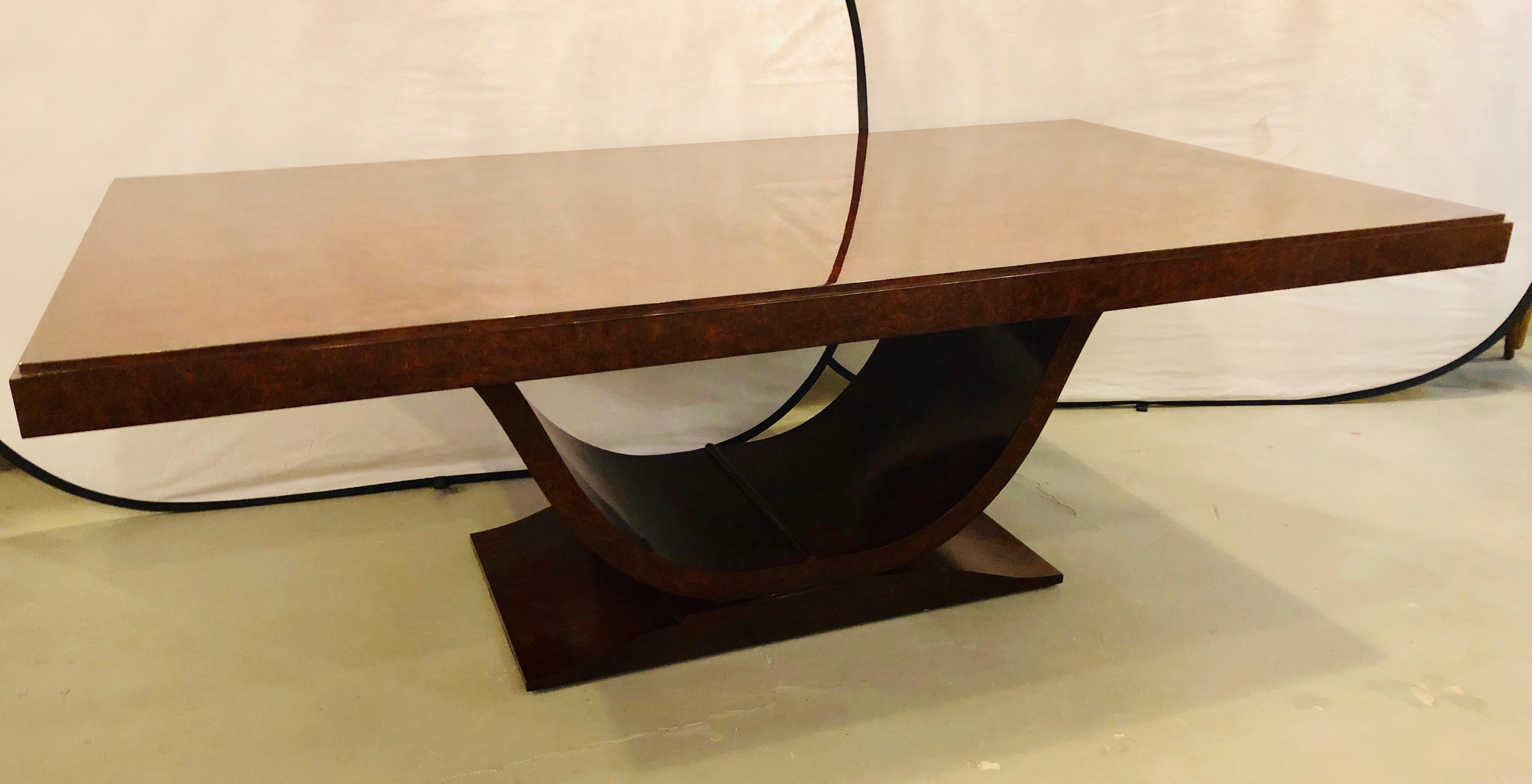 Émile-Jacques Ruhlman Style Burled Walnut Dining Table, French Art Deco Style
This elegant Art Deco silhouette defines this gorgeous table. Featuring a rich cocoa finish, hand rubbed to a satin soft gloss. Clean lines with sleek curves, this newly